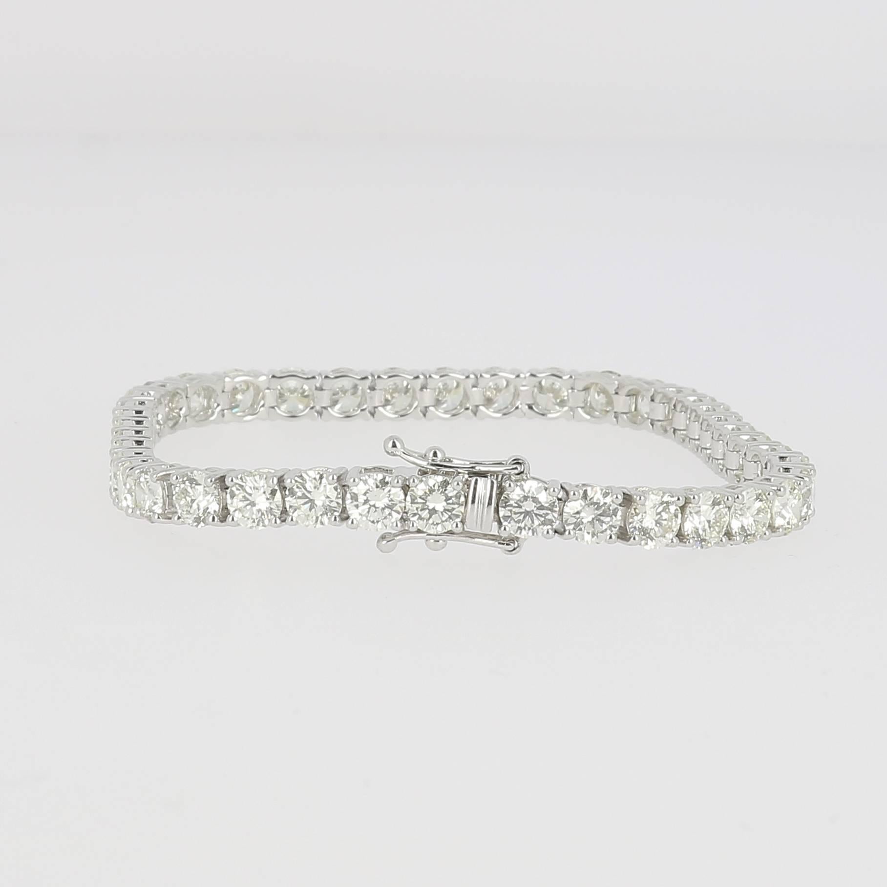 Beautiful And Classic Tennis Bracelet.
The bracelet is 18K White Gold.
There are 12.44 Carats in Diamonds.
There are 40 Round Diamonds .
The bracelet is inches 7,5 long (19 cm).
The bracelet weighs 15.83 grams.
Feel free to ask if you need a special
