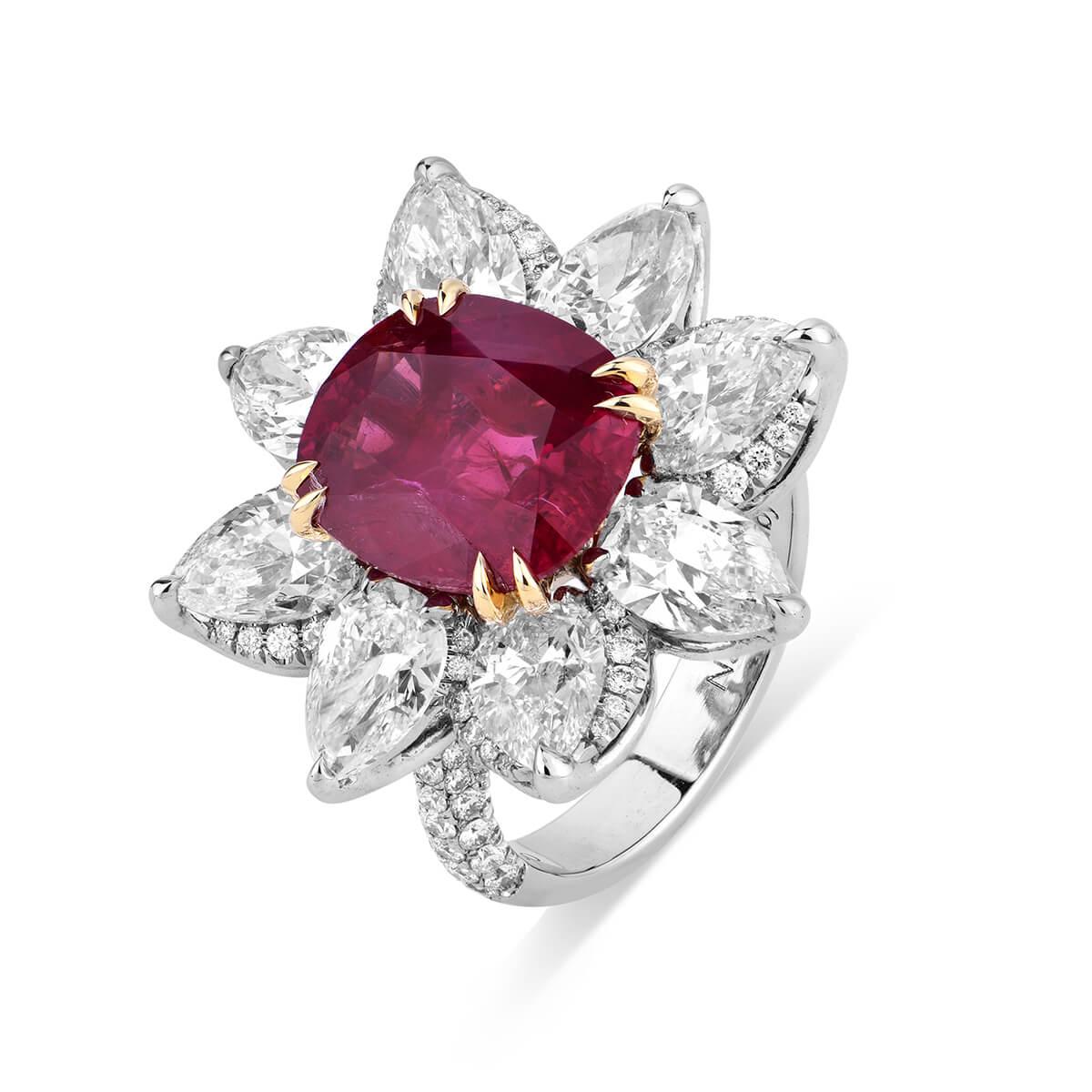 Natural, untreated red ruby surrounded by white diamonds. The main Ruby stone is 6.18 Carats, together with the White Diamonds makes a total of 12.44 Carats. Unheated. Dress Ring, Occassion Ring, Cocktail Ring. 
This Item can be altered and