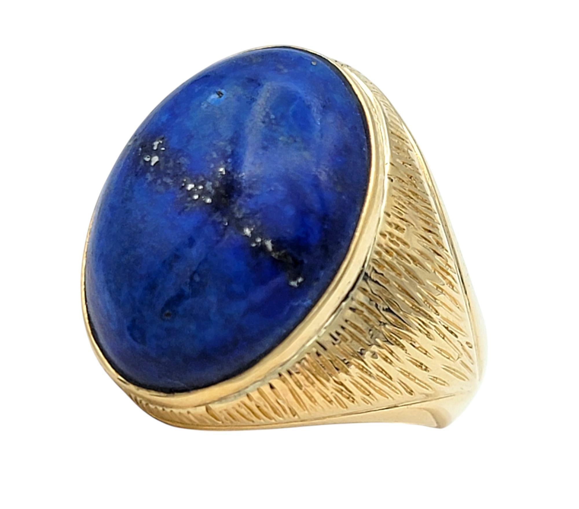 Contemporary 12.45 Carat Oval Cabochon Cut Blue Lapis Cocktail Ring in Textured Yellow Gold For Sale