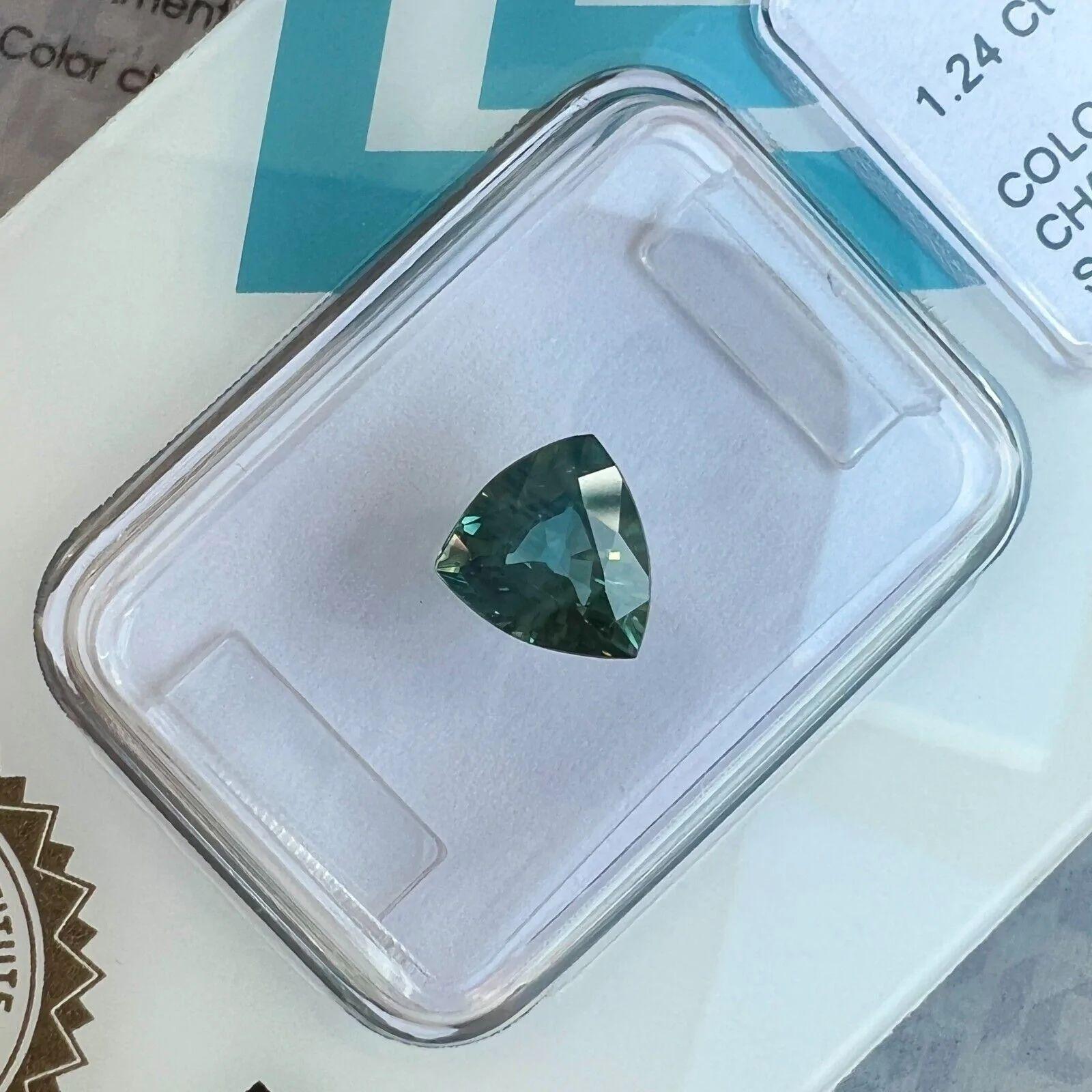 1.24ct Australian Colour Change Sapphire No Heat IGI Certified Triangle Cut

Rare Untreated Australian Colour Change Sapphire Gemstone.
1.24 Carat unheated sapphire with a rare colour change effect. Changing colour depending on the light its viewed