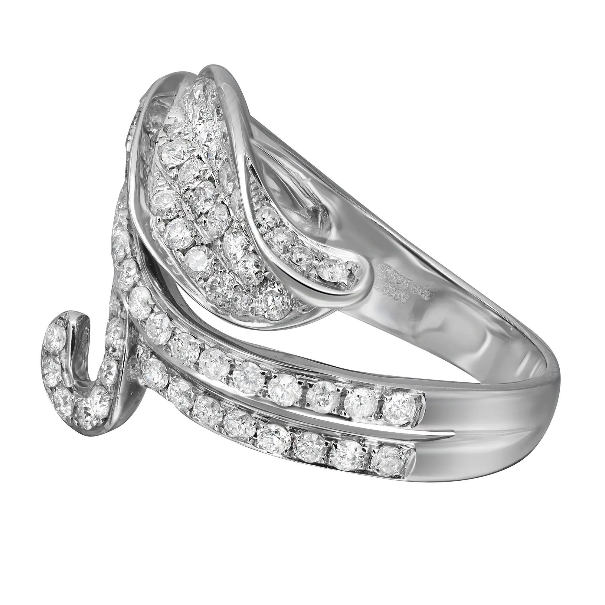This beautiful diamond cocktail ring features shimmering round brilliant cut diamonds in prong setting with a beautiful leaf design. Total diamond weight: 1.24 carats. Diamond quality: I color and SI clarity. Crafted in 14K white gold. The ring size