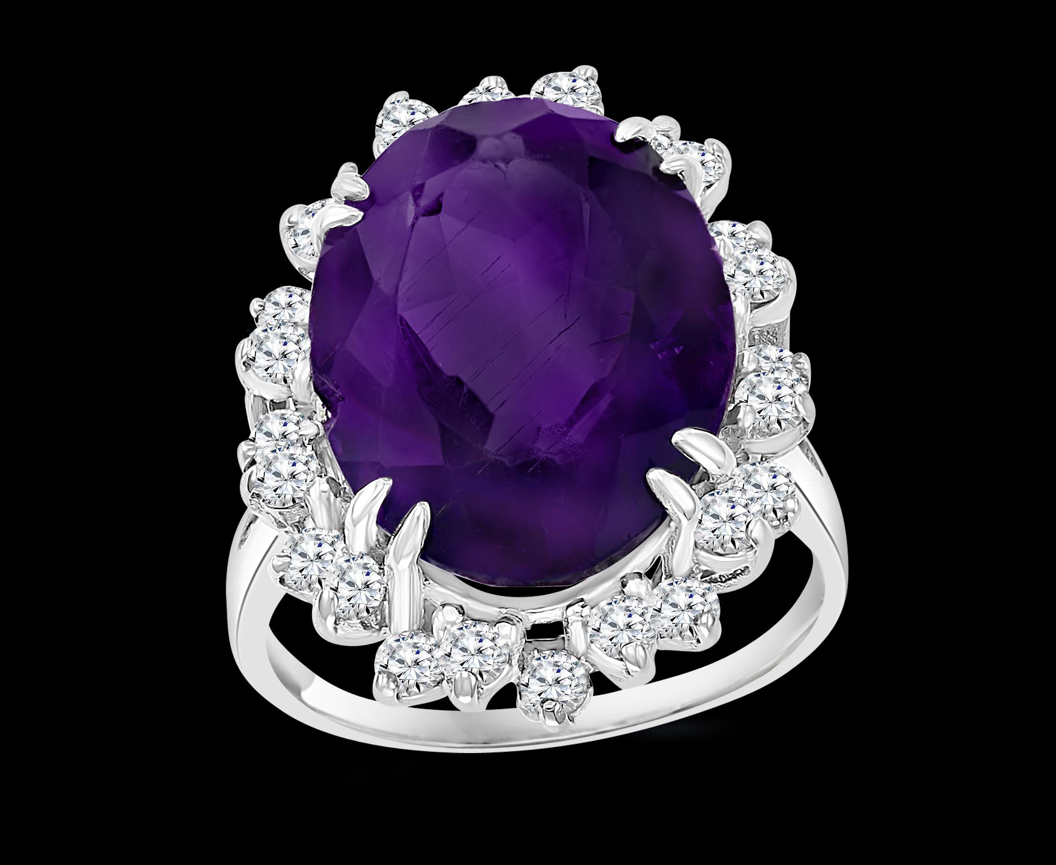 12.5 Carat Amethyst and 1 Ct Diamond Cocktail /Engagement Ring in 14 karat White gold,Estate from 1970's

This is a ring which has a 12.5 carat of high quality Amethyst . Color and clarity is very nice.
24 round brilliant cut diamonds weighing 1 ct