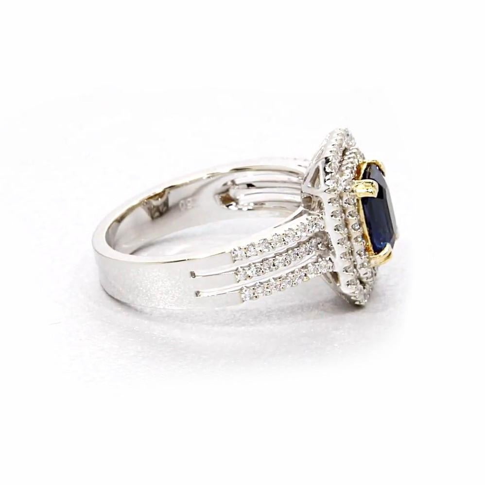 Artisan 1.25 Carat Blue Sapphire and Diamond Halo Engagement Ring in 18k Gold  For Sale