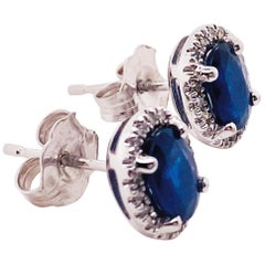 1.25 Carat Blue Sapphire and Diamond Halo Oval Earring Studs in 14 Karat Gold