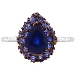 1.25 Carat Pear Shape Blue Sapphire and Diamond Halo Ring 18K White Gold