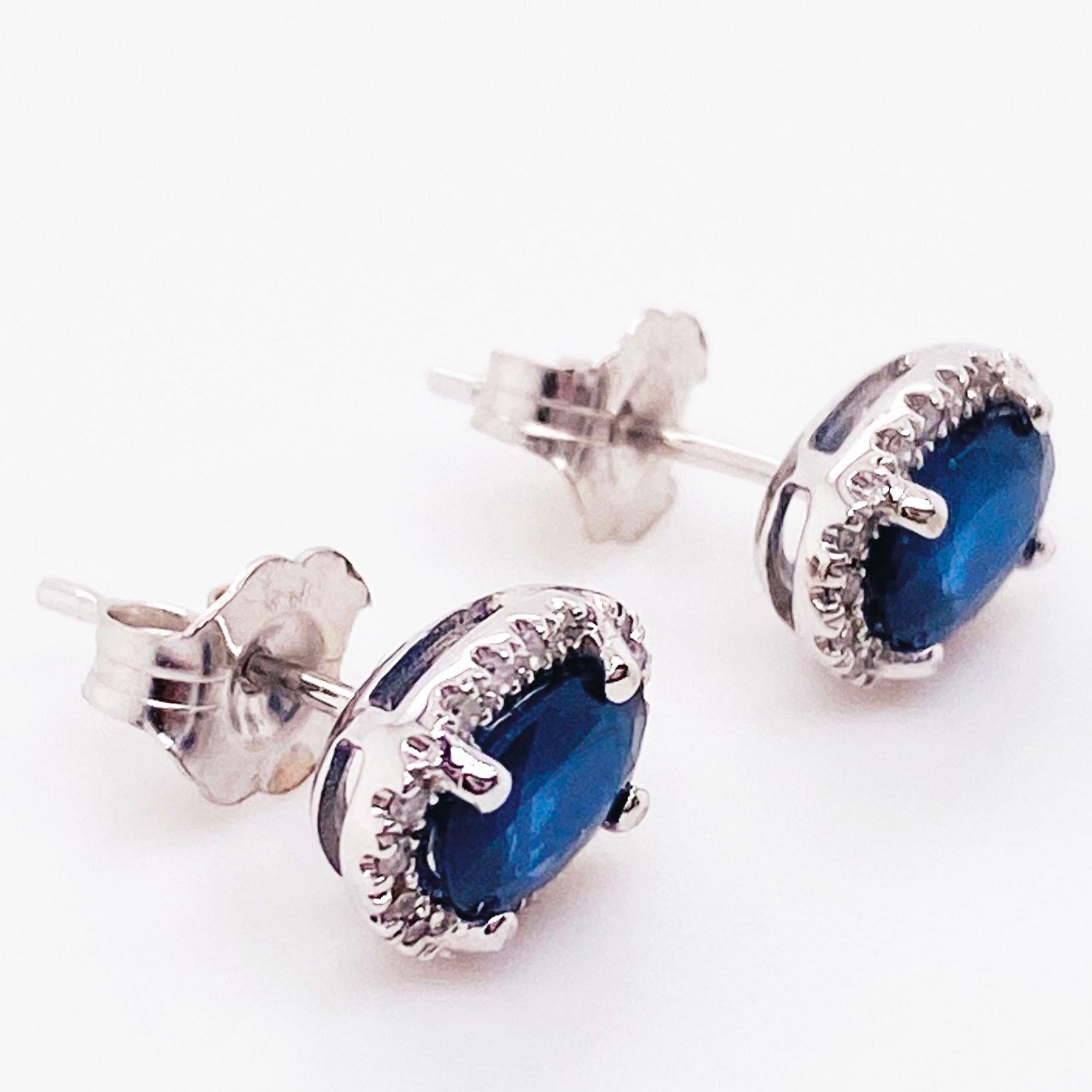 Modern 1.25 Carat Blue Sapphire and Diamond Halo Oval Earring Studs in 14 Karat Gold