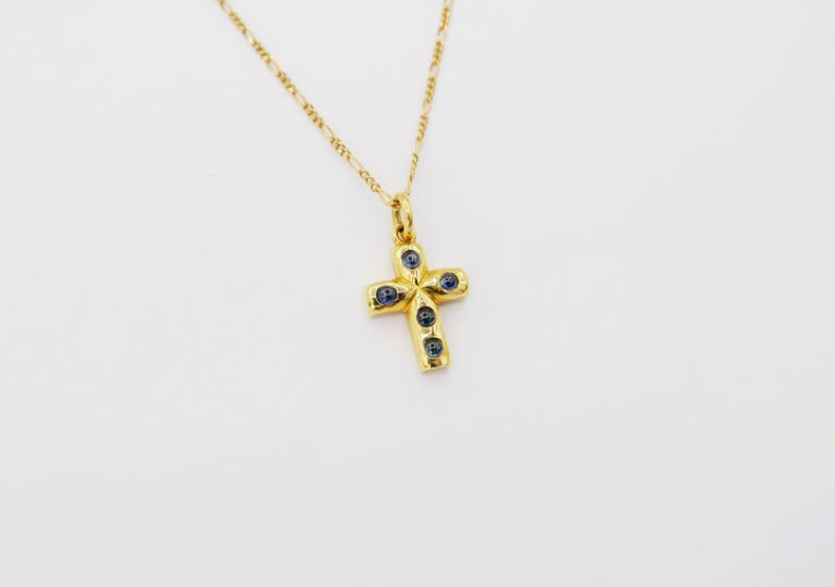 1.25 Carat Cabochon Sapphire 18K Yellow Gold Cross Dainty Figaro Chain Necklace

Gold: 18K Yellow Gold, 5.308 g
Sapphire: 1.25 ct

Chain length: 17 inches
Pendant dimensions: 0.5