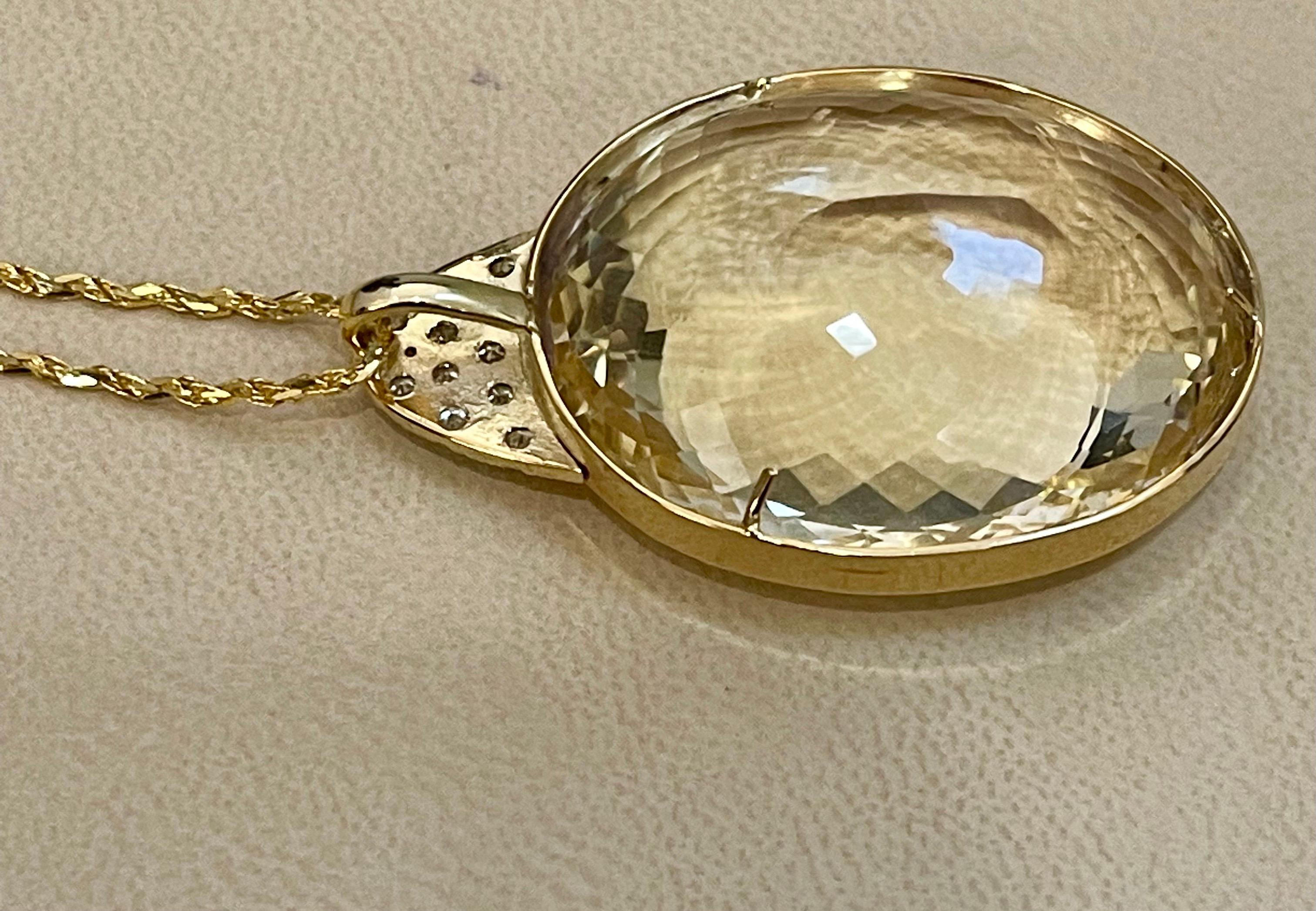 Oval Cut 125 Carat Citrine & Diamond Pendent or Necklace 14 Karat Yellow Gold with Chain For Sale