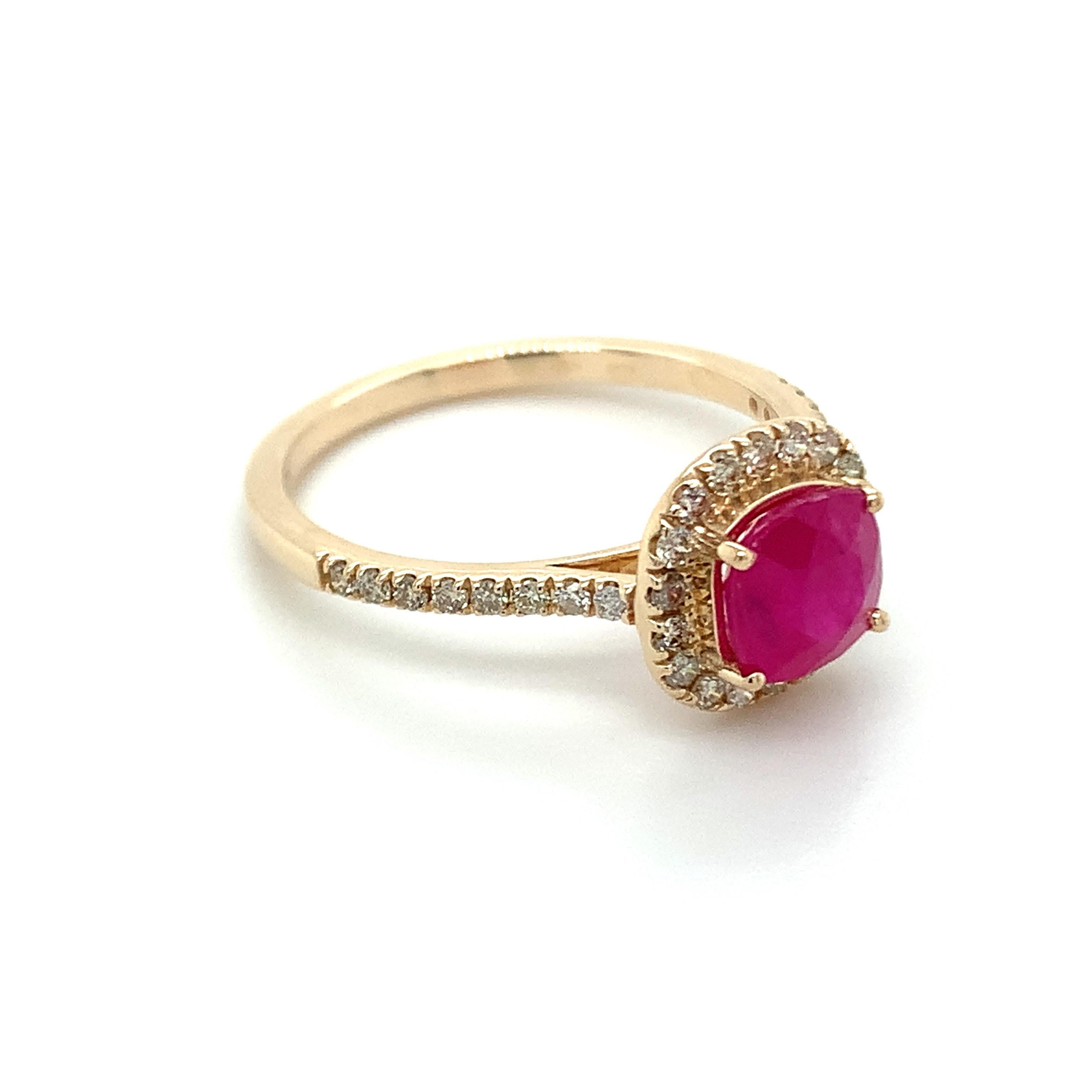 Cushion shape Ruby gemstone beautifully crafted in a 10K yellow gold ring with natural diamonds.

An exquisite red color birthstone for July. Believed to convey a status of power & wealth. Explore a vast range of precious stone Jewelry in our store.