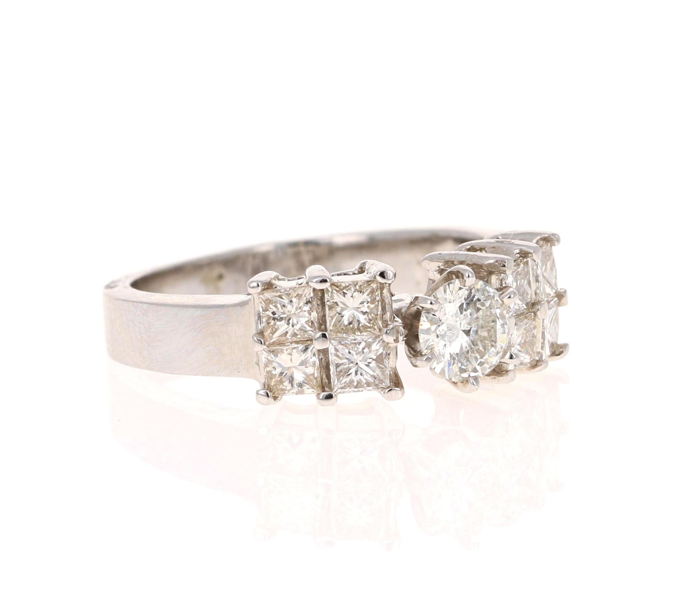 This pretty setting has a Round Cut Diamond in the center that weighs 0.38 Carats and 8 Princess Cut Diamonds on the side that weigh 0.87 Carats.  The total carat weight of the ring is 1.25 Carats. 

It is beautifully set in 14 Karat White Gold and
