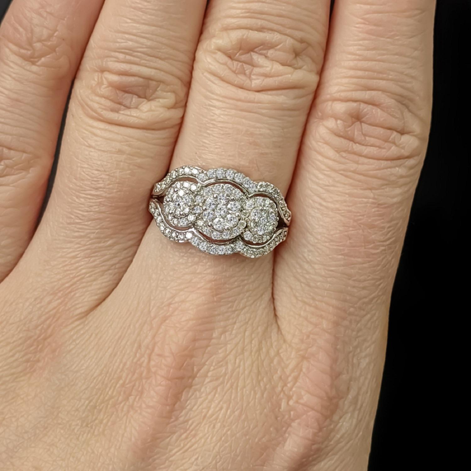 Beautifully made ring with 1.25ct of natural diamonds. The diamonds are white (colorless) and do not have any visible imperfections. The diamonds are all well-cut and have very nice sparkle. They are pave and illusion set together which means the