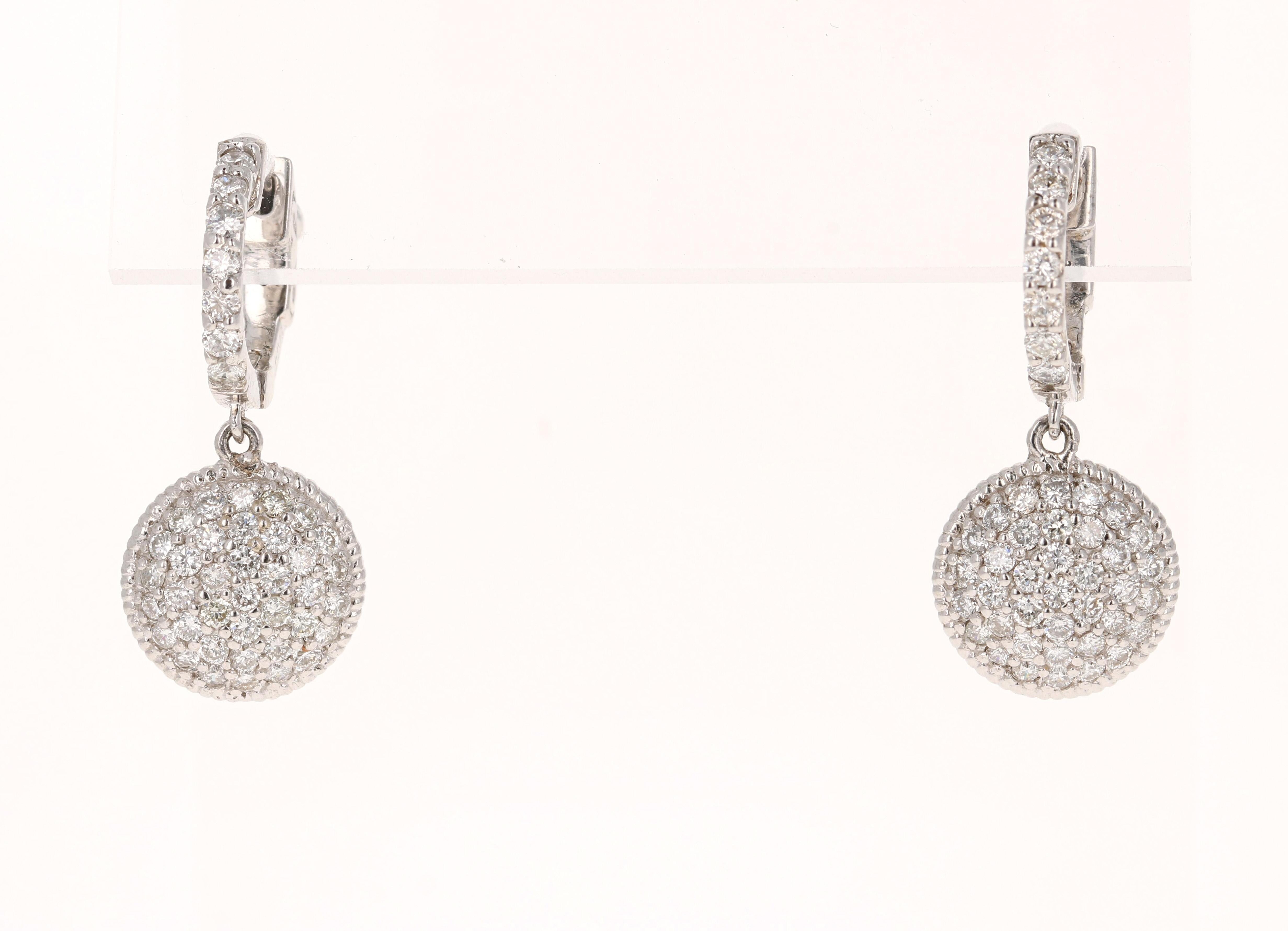 86 Round Cut Diamonds that weigh 1.25 Carats (Clarity: VS2/Color: F).  

Made in 14K White Gold weighing approximately 5.0 grams.  

They are about 1 inch in length (2.5cm) with a lever-back closure for ease of wearing and safety.