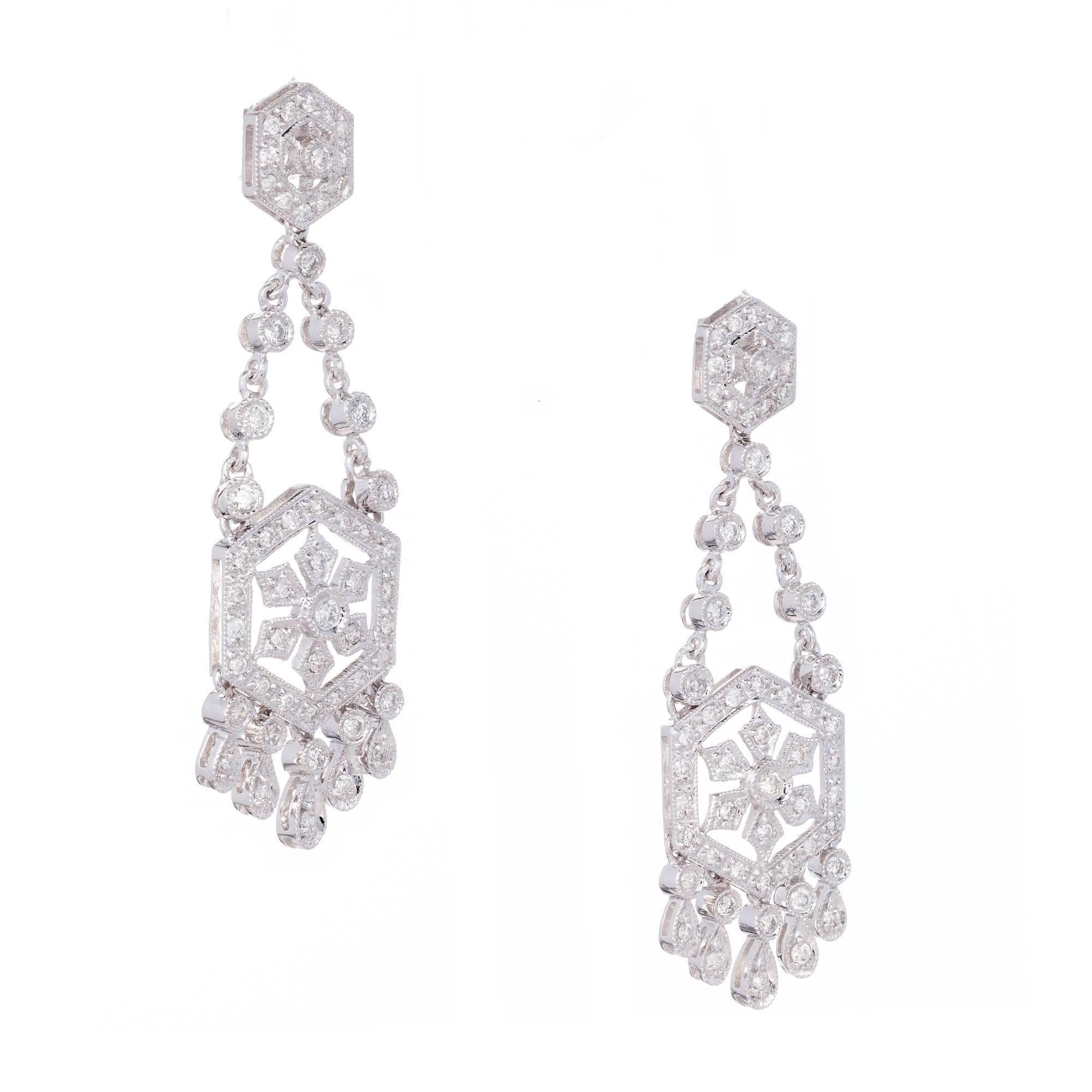 Chandelier style full cut Diamond dangle earrings in 18k white gold.

119 round full cut Diamonds, approx. total weight 1.25cts, H, SI1
18k white gold
Stamped: 750
7.4 grams
Top to bottom: 44.96mm or 1.77 inches
Width: 12.65mm or .5 inch
Depth: