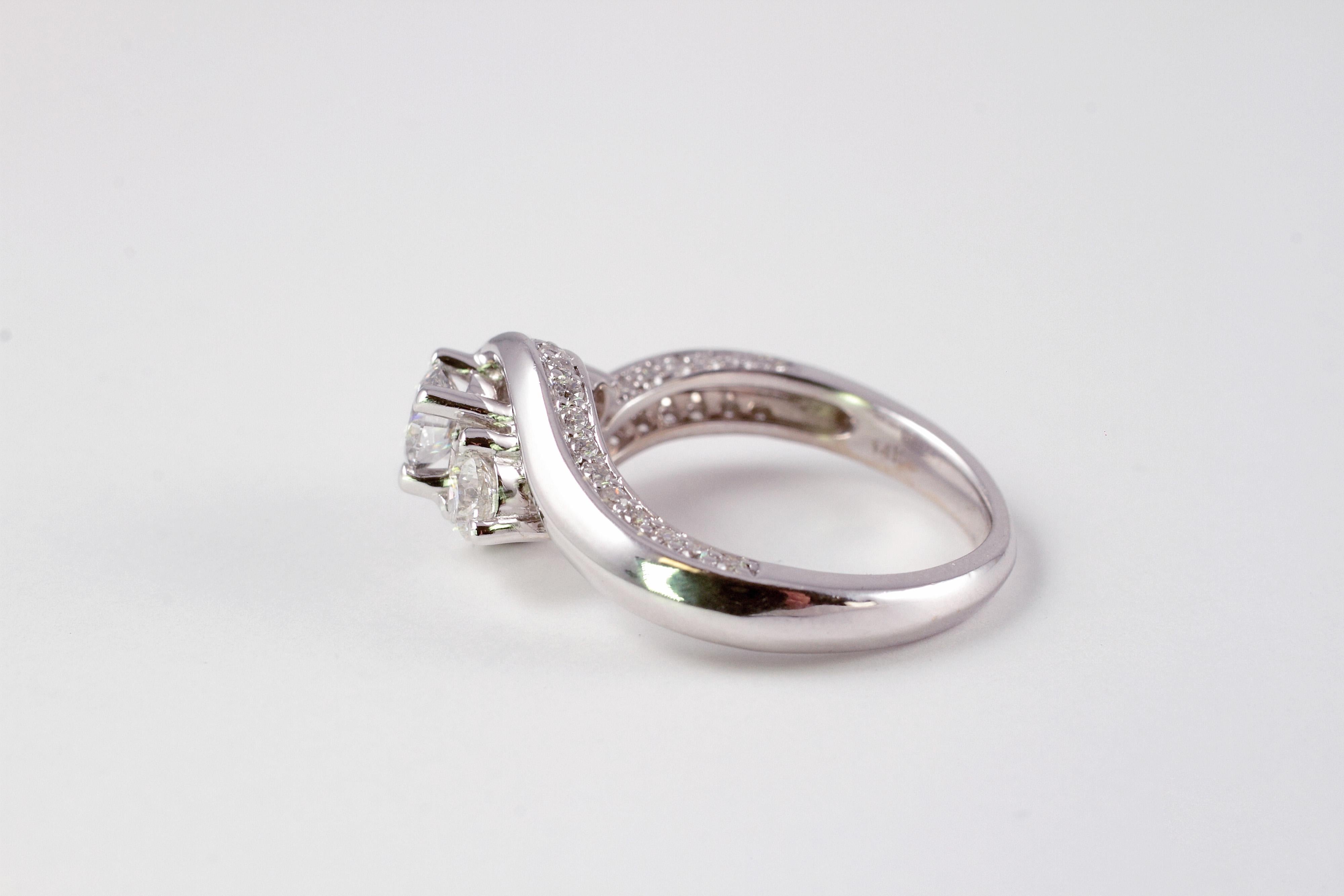 Round Cut 1.25 Carat Diamond Three-Stone Ring in 14 Karat White Gold For Sale