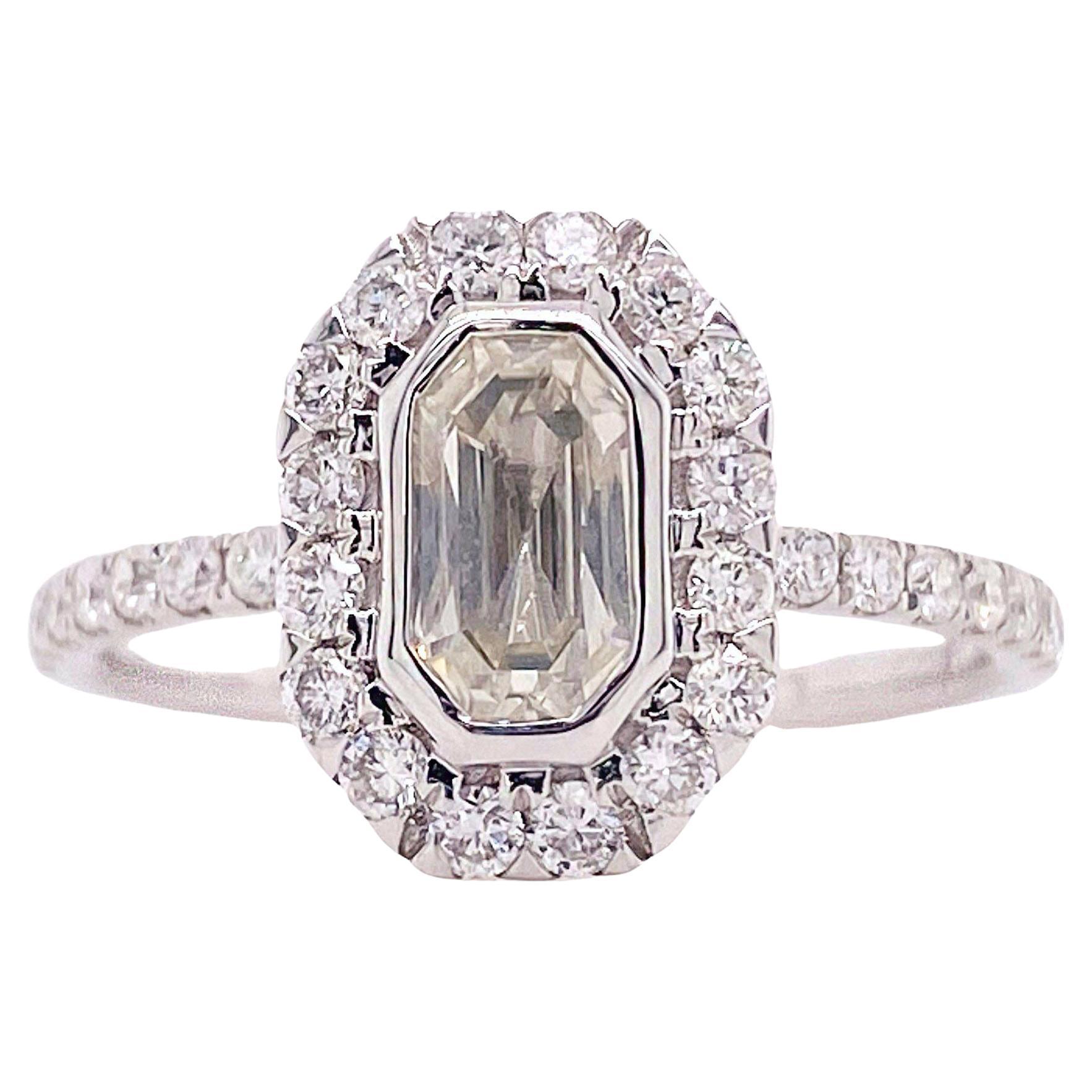 1.25 Carat Emerald Cut Diamond & French Set Diamond Halo Engagement Ring in 18k For Sale
