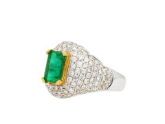 1.25 Carat Emerald Cut Emerald and White Diamond Cluster Ring in 18k White Gold