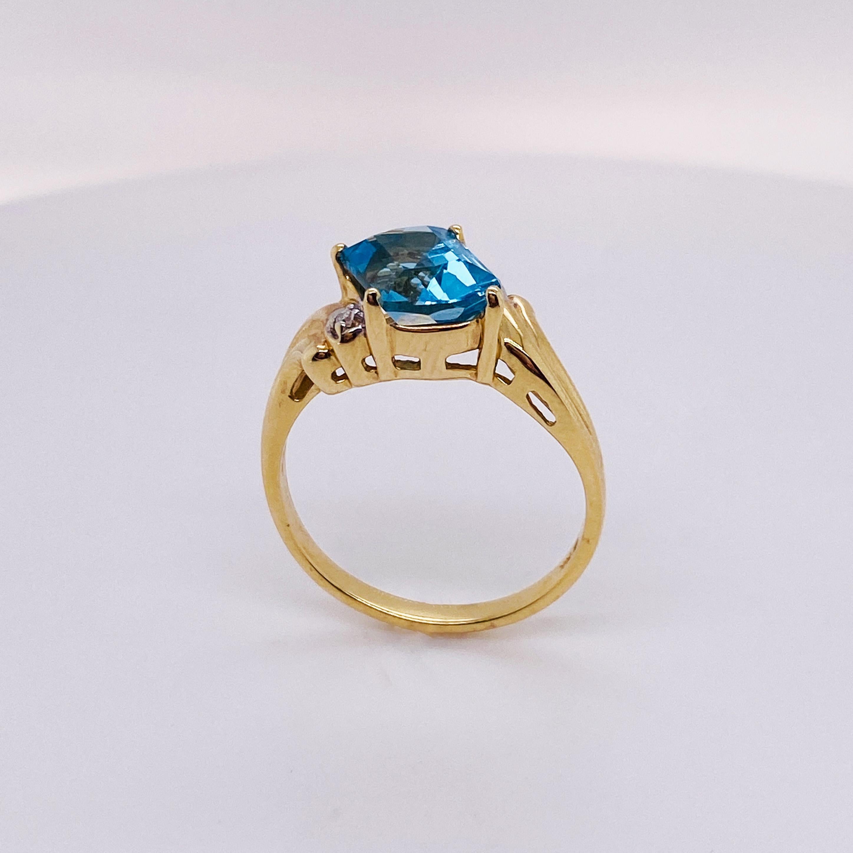 Mixed Cut 1.25 Carat Fancy Cut Blue Topaz, 14k Gold Bypass Ring with Diamond Accents For Sale