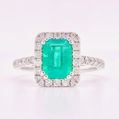 1.25 Carat Genuine Emerald and .50 Carat Diamond Halo Engagement Ring, 18 Karat