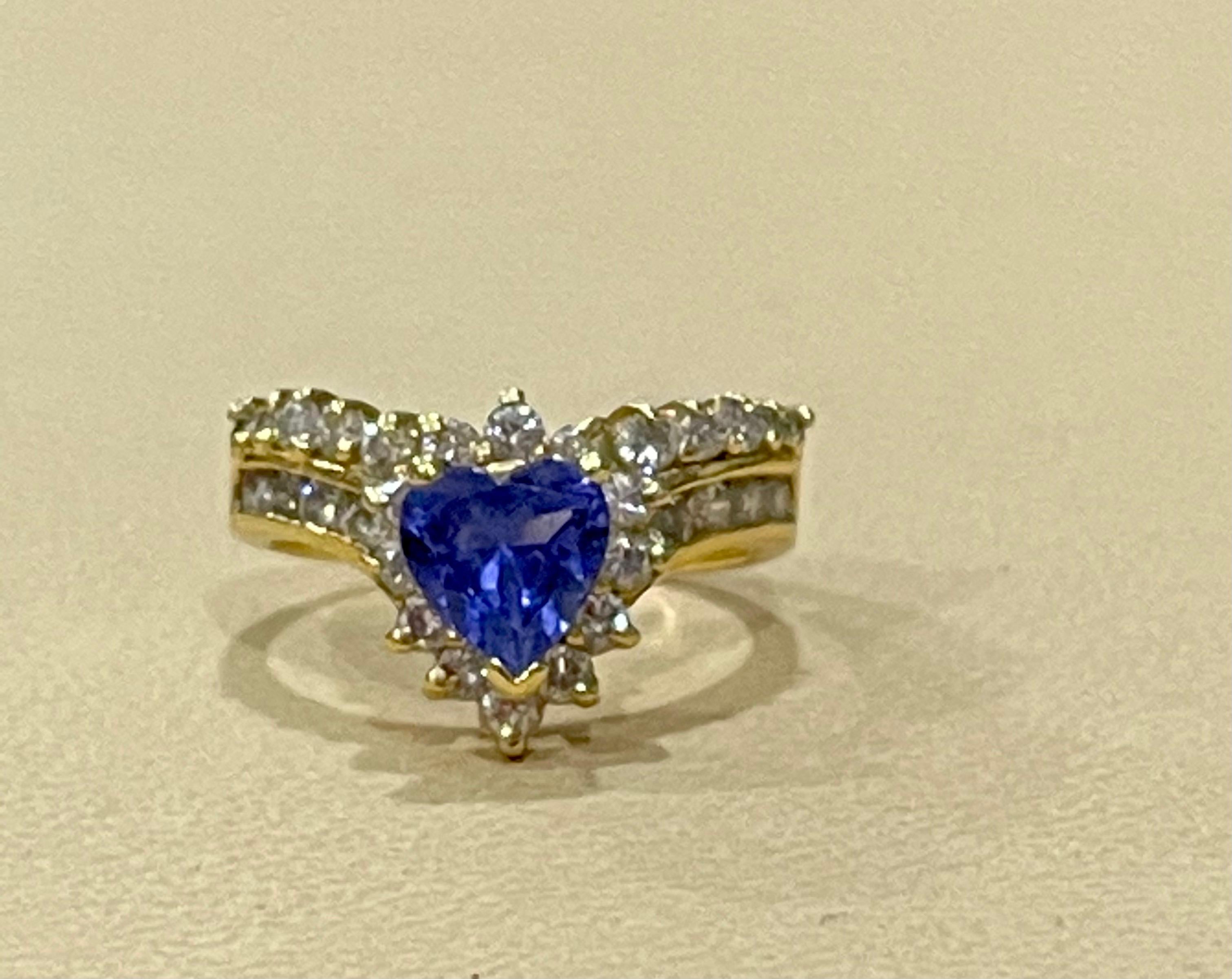 Heart Cut 1.25 Carat Heart Shape Tanzanite and 1.5 Carat Diamond Ring 14 Karat Yellow Gold For Sale