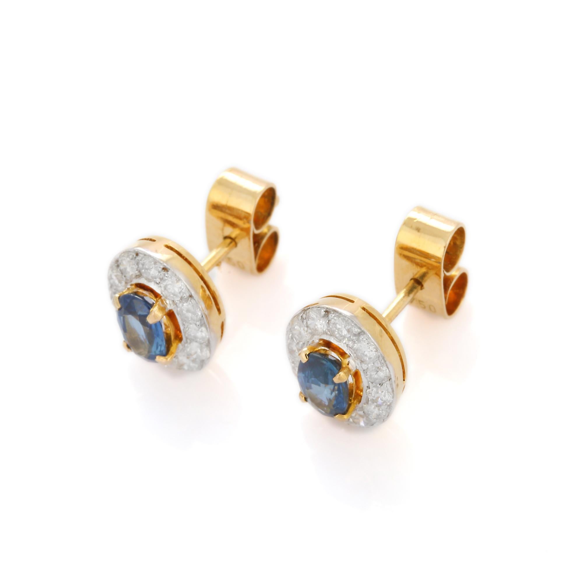 Studs create a subtle beauty while showcasing the colors of the natural precious gemstones and illuminating diamonds making a statement.

Oval cut blue sapphire studs with diamonds in 18K gold. Embrace your look with these stunning pair of earrings