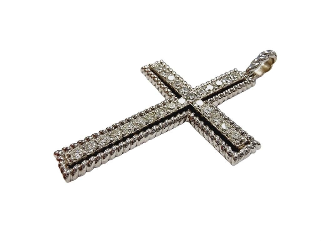 Beautiful Natural Diamond Cross Pendant White Gold 14K. A total weight of 1.25 ctw natural round cut diamonds very sparkly and shiny look.
Measurements: 2 inch Long x 1.20 inch wide
Average Color/Clarity: H-VS