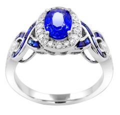 1.25 Carat Oval Blue Sapphire and Diamond 14K White Gold Cocktail Ring