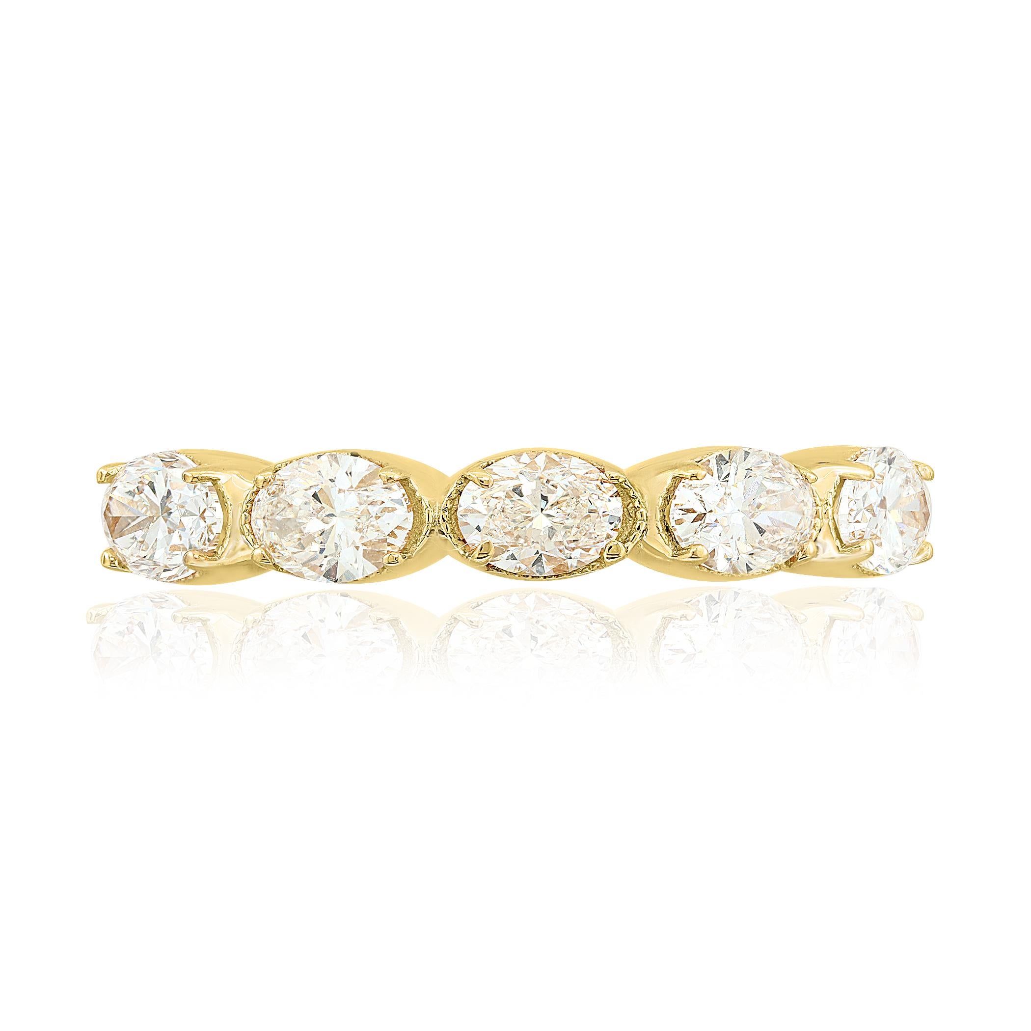 Unique and chic five-stone ring that can be used as a fashion ring or wedding band. Features five oval cut diamonds set in a shared prong setting in 14K Yellow Gold. Oval cut diamonds weigh 1.25 carats total.

All diamonds are GH color SI1