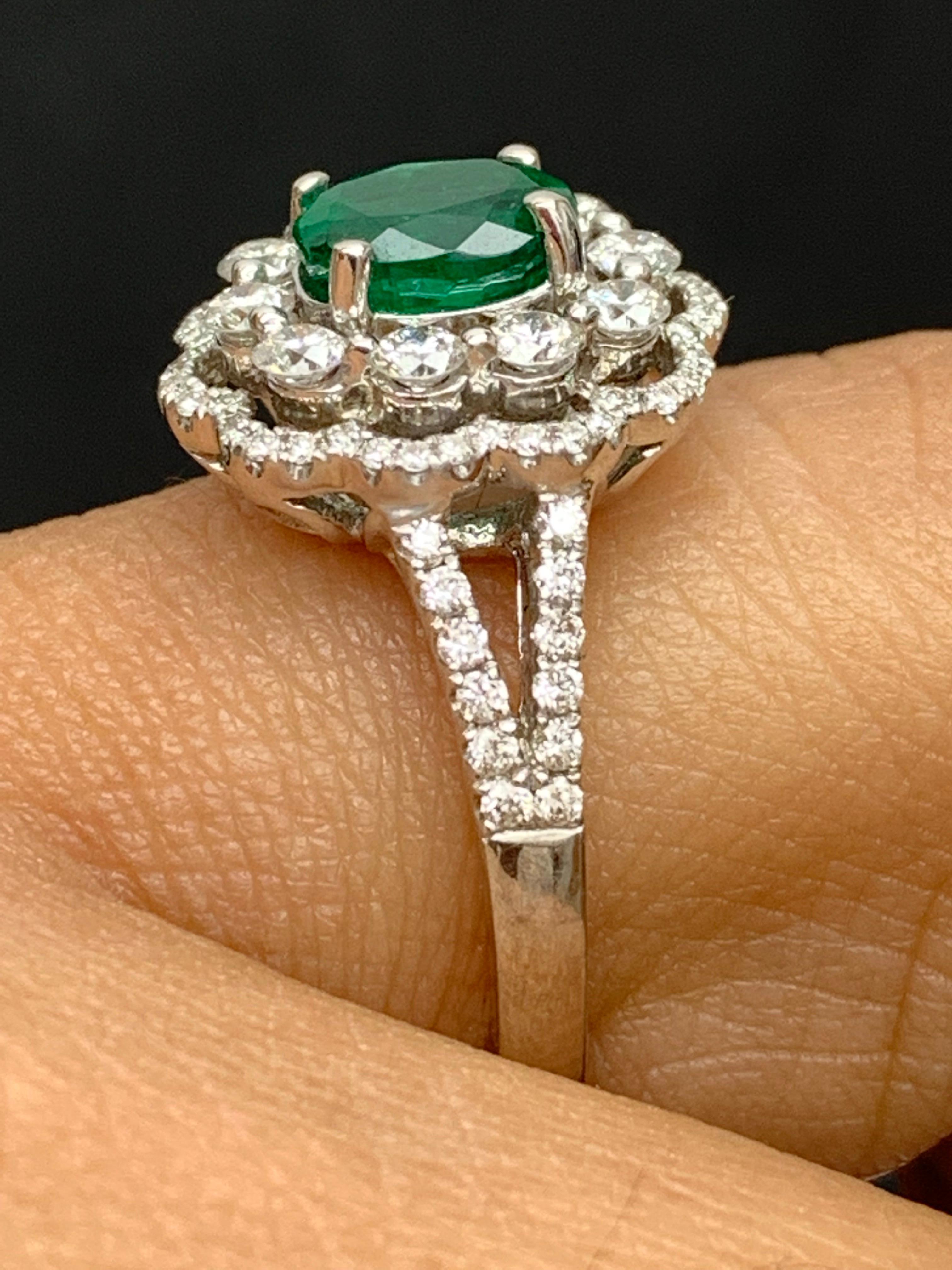 1.25 Carat Oval Emerald and Diamond Cocktail Flower Ring in 18K White Gold For Sale 4