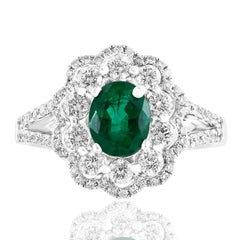 1.25 Carat Oval Emerald and Diamond Cocktail Flower Ring in 18K White Gold