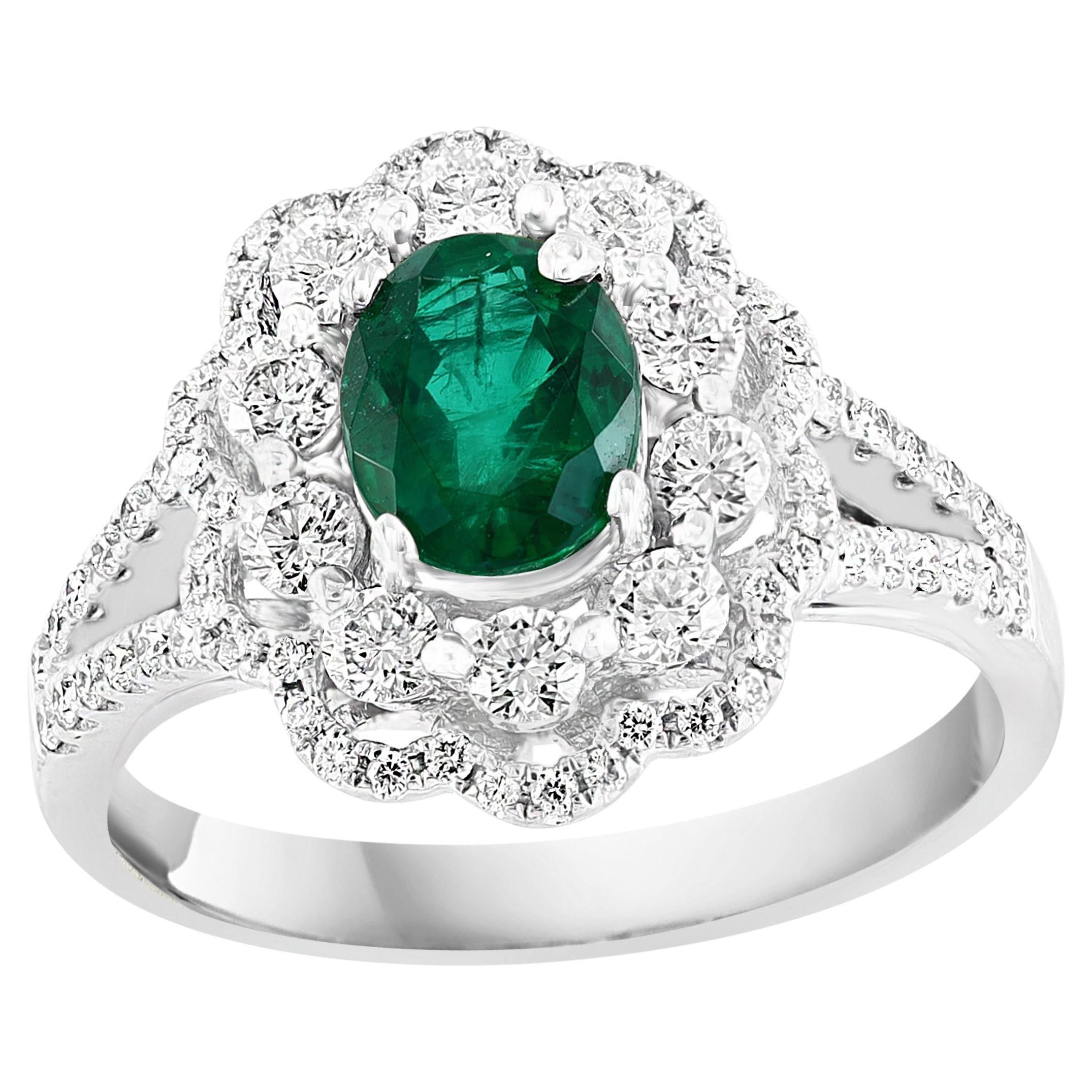 1.25 Carat Oval Emerald and Diamond Cocktail Flower Ring in 18K White Gold For Sale