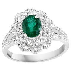 1.25 Carat Oval Emerald and Diamond Cocktail Flower Ring in 18K White Gold