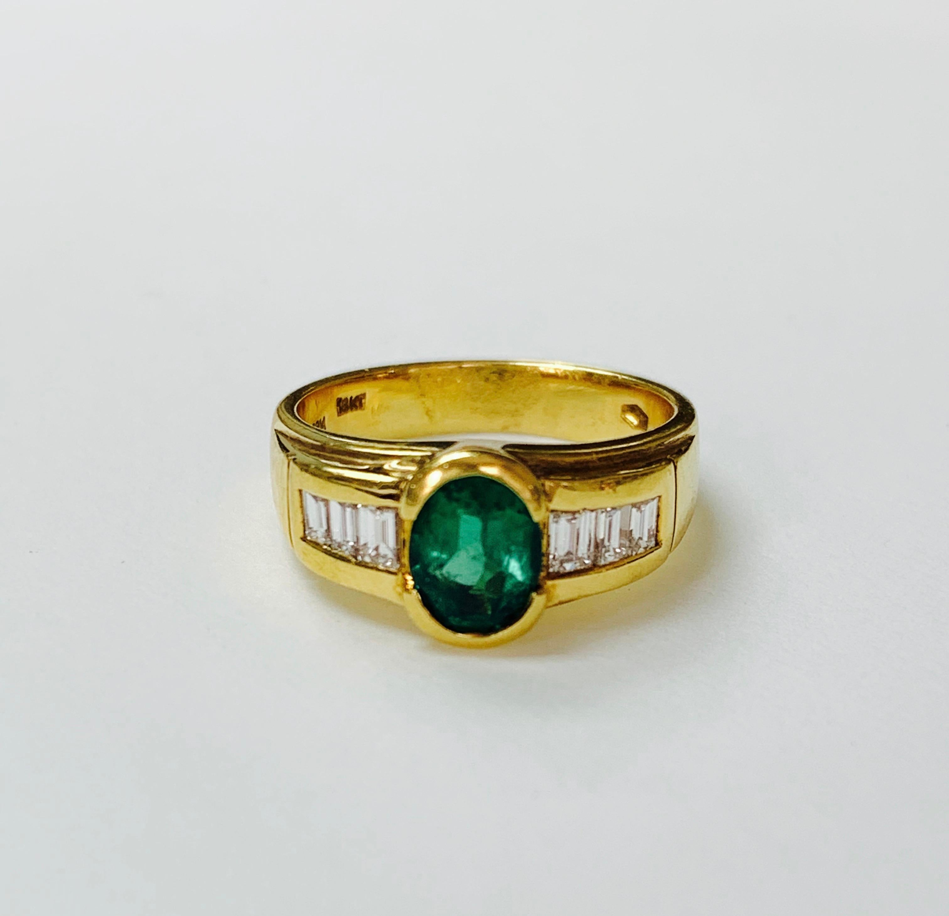 Moguldiam Inc Oval Emerald And Diamond Engagement Ring hand crafted in 18k yellow gold. 
The details are as follows : 
Emerald weight : 1.25 carat 
Diamond weight : 0.50 carat 
Metal : 18K yellow gold 
Ring size : 6 1/4 
