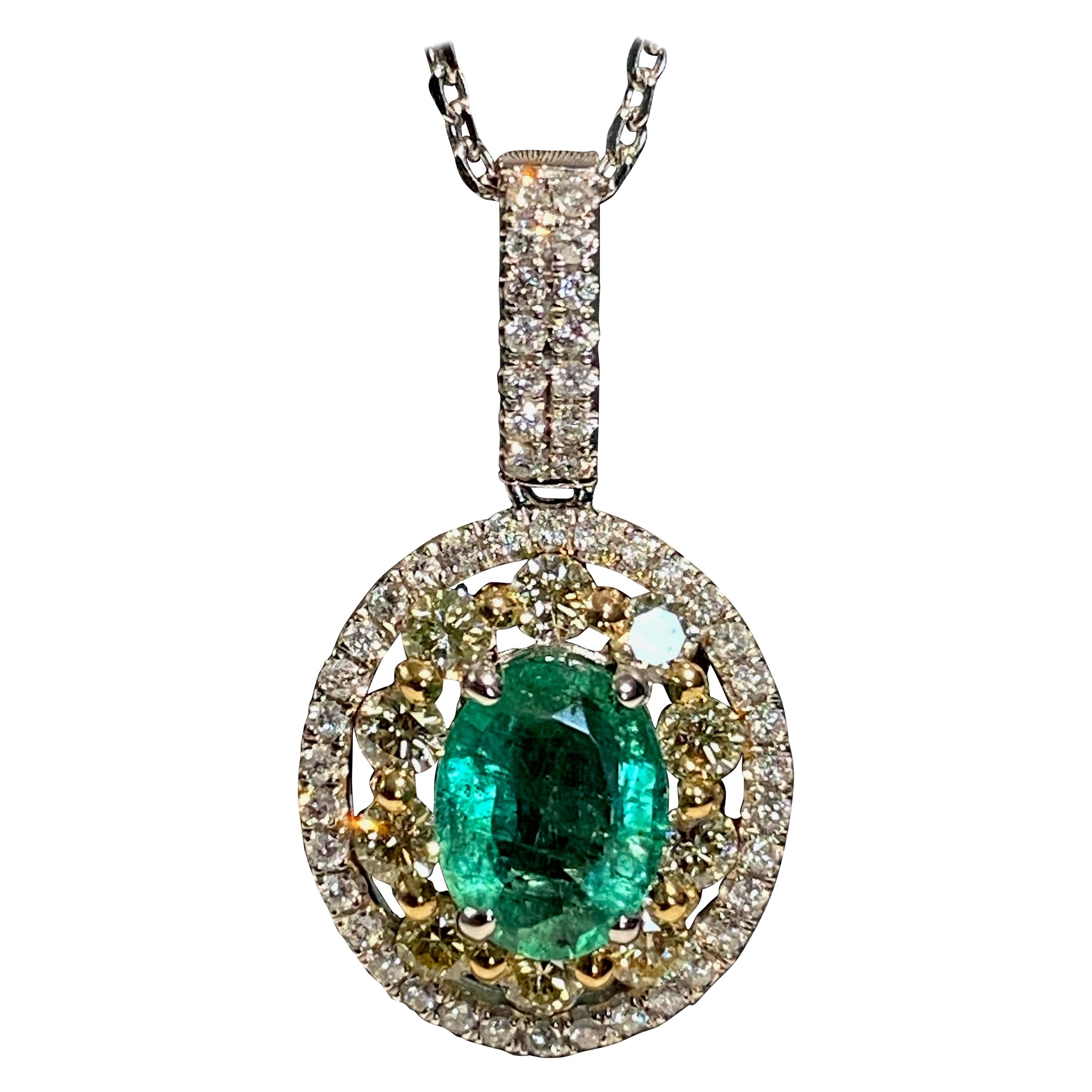 1.25 Carat Oval Emerald Diamond Halo Pendant