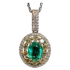 1.25 Carat Oval Emerald Diamond Halo Pendant