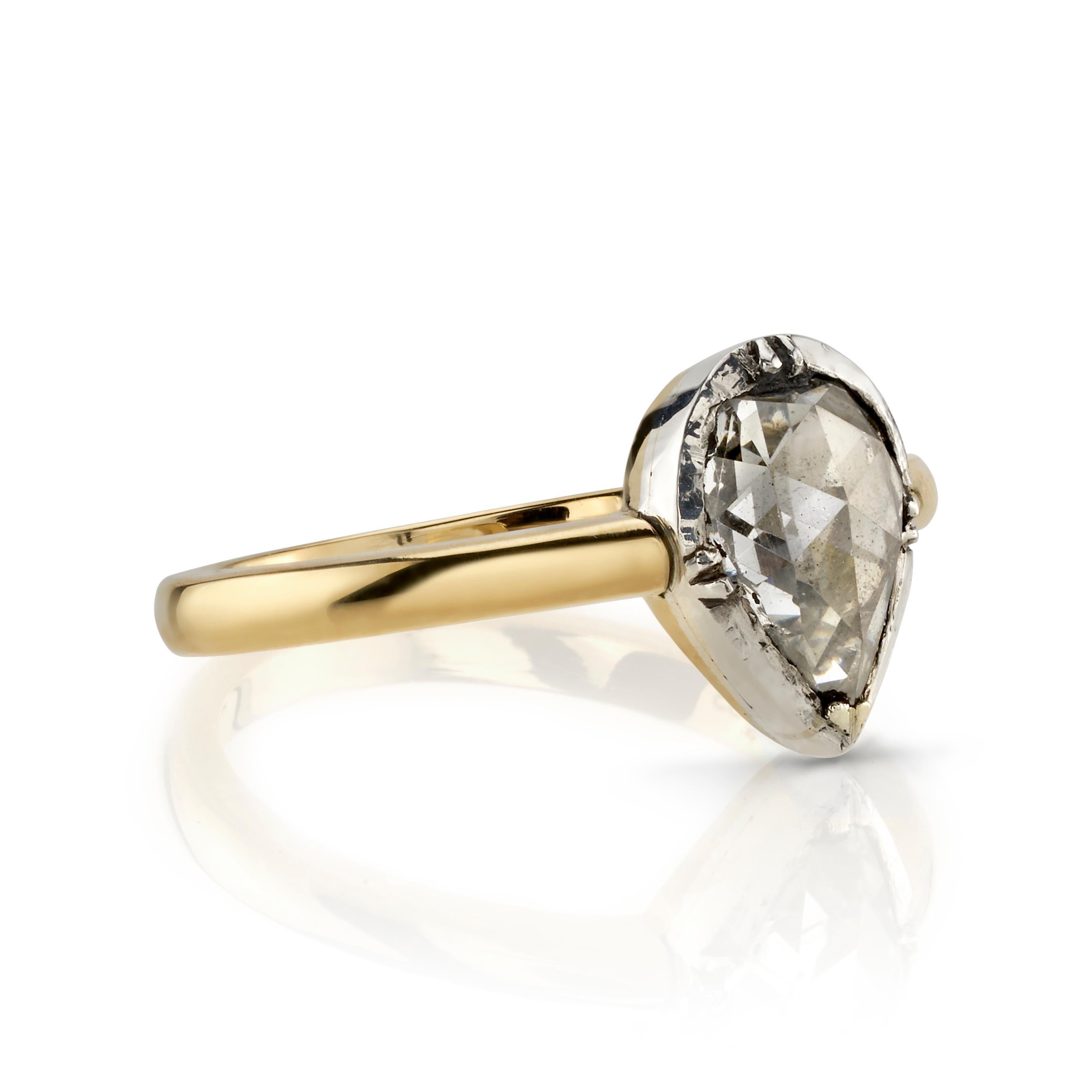 1.25ct J-K/SI pear shaped rose cut diamond set in a handcrafted 18K yellow gold mounting. Diamond is prong set in an oxidized sterling silver head.

Ring is currently size 6. Please contact us about potential re-sizing.

Our jewelry is made locally