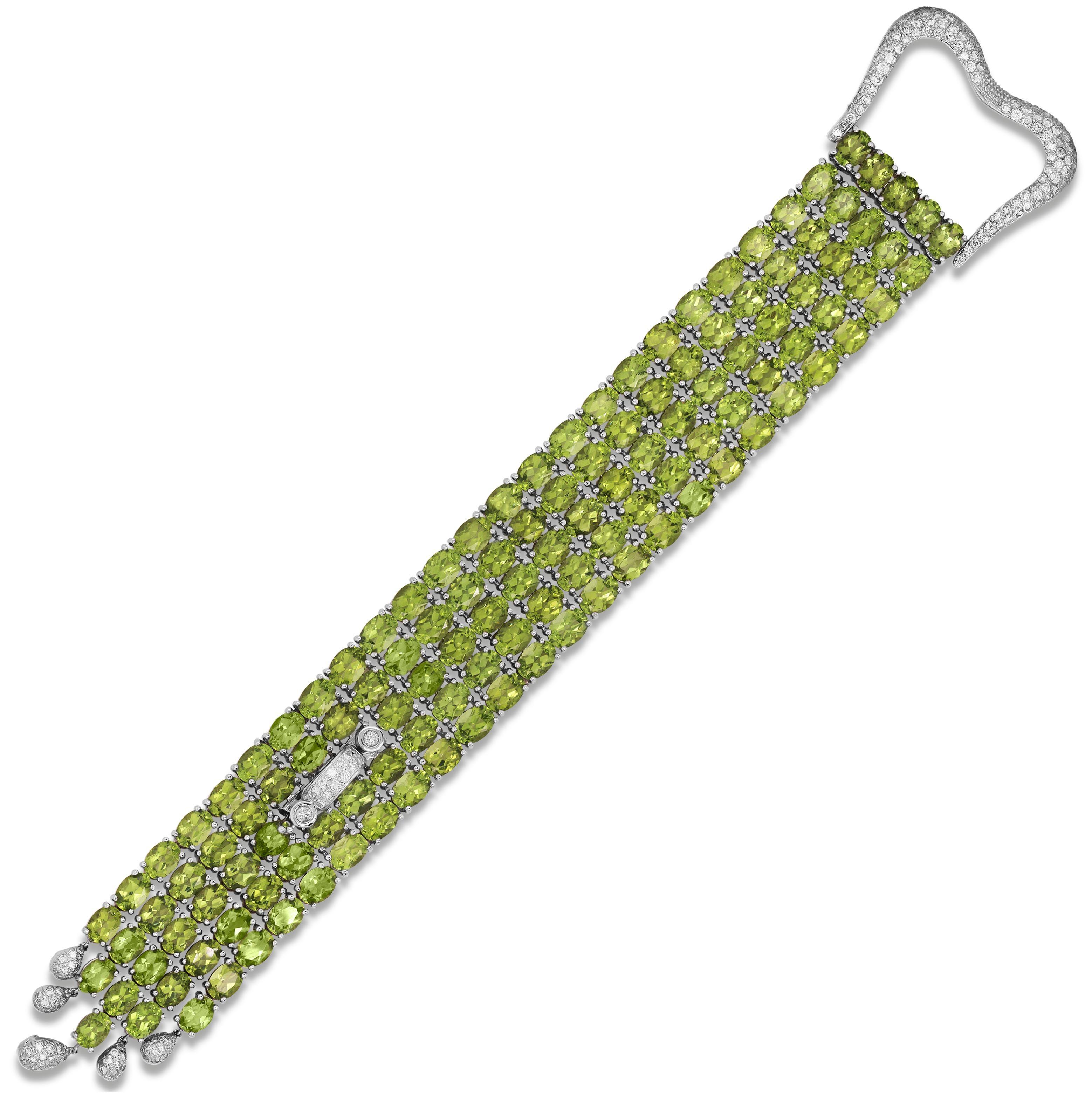 Contemporary 125 Carat Peridot 18K White Gold and Diamonds Buckle Style Five Row Bracelet For Sale