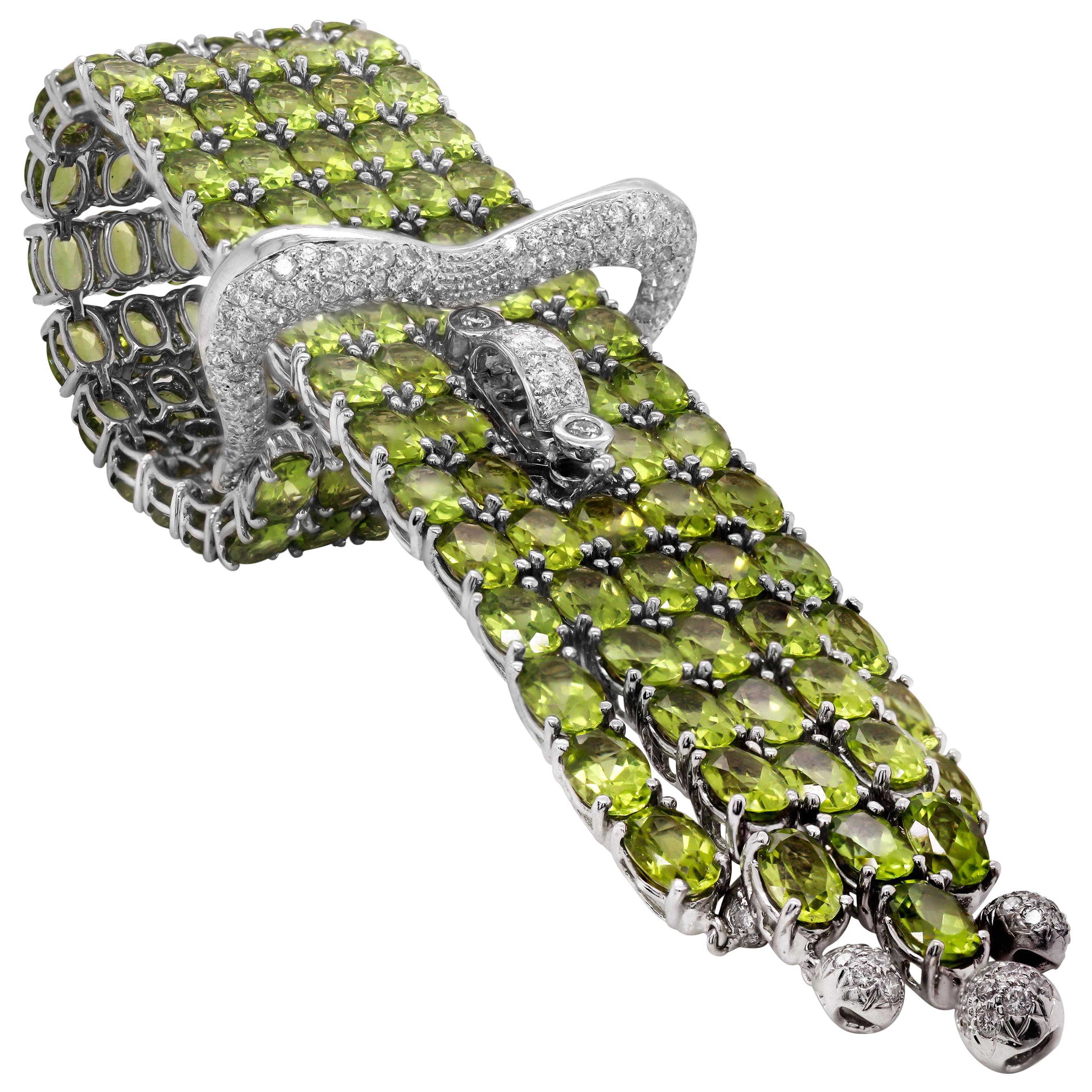 125 Carat Peridot 18K White Gold and Diamonds Buckle Style Five Row Bracelet For Sale