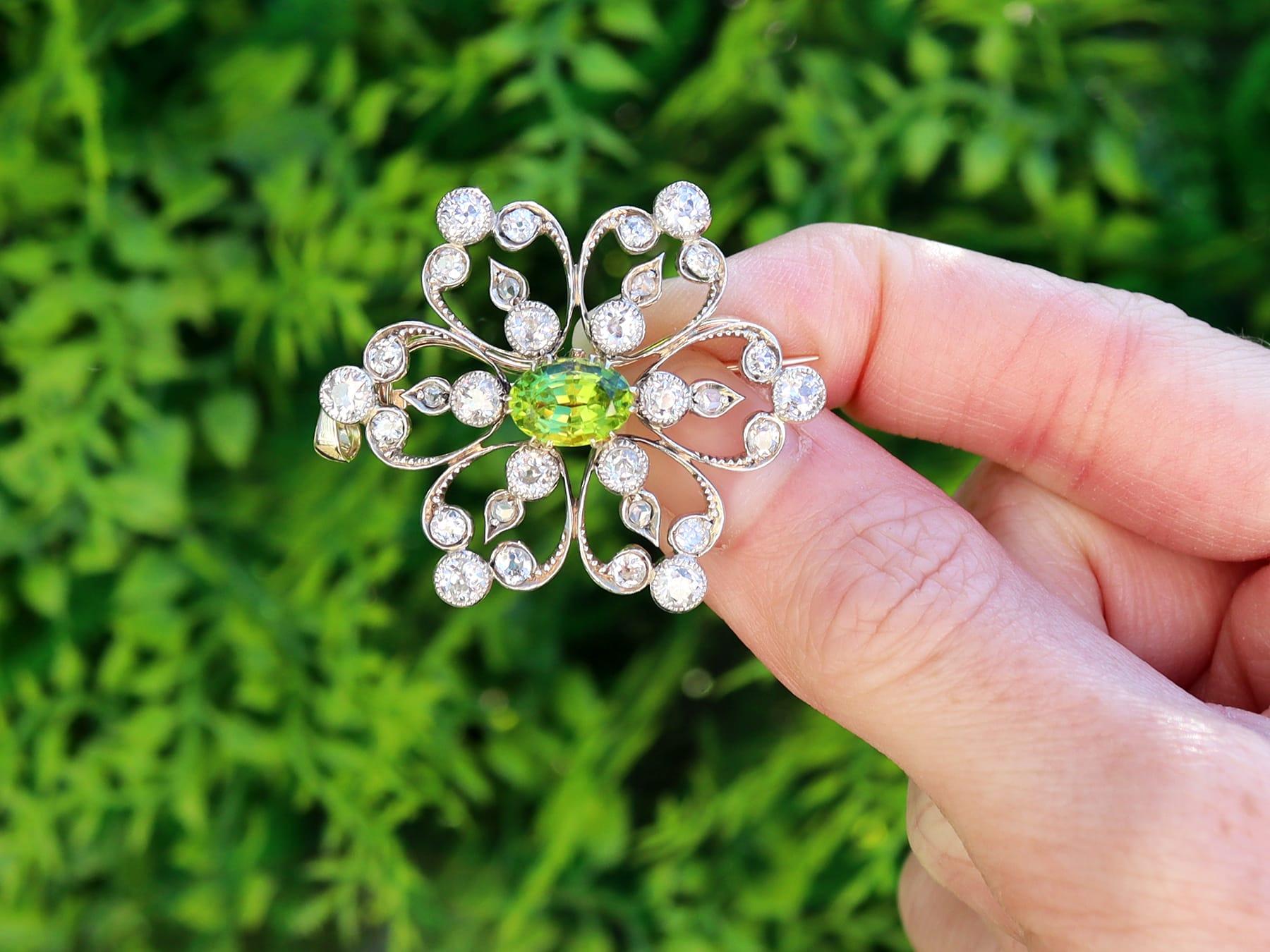 A stunning, fine and impressive antique Victorian 1.25 carat peridot and 1.95 carat diamond, 9 karat yellow gold and silver set pendant / brooch; part of our diverse antique peridot jewelry collections.

This stunning, fine and impressive antique