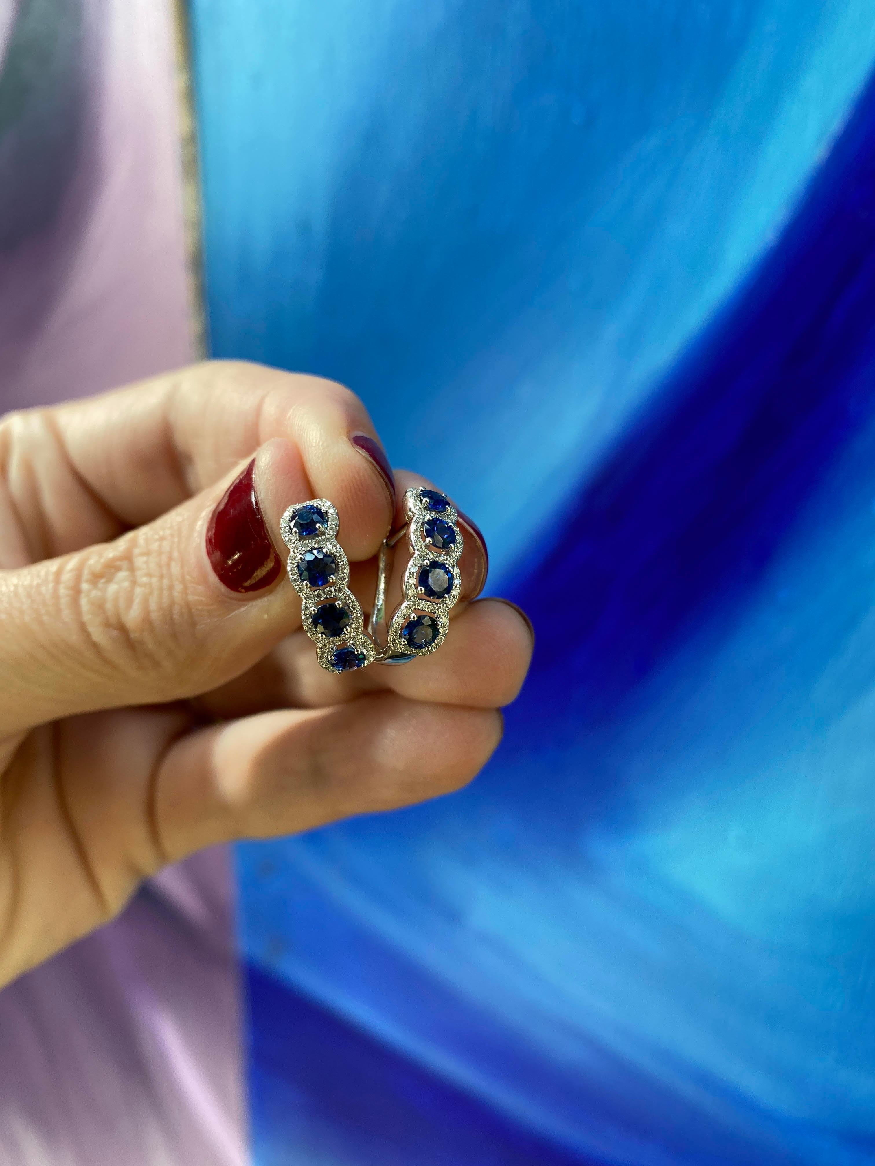 blue sapphire huggie earrings