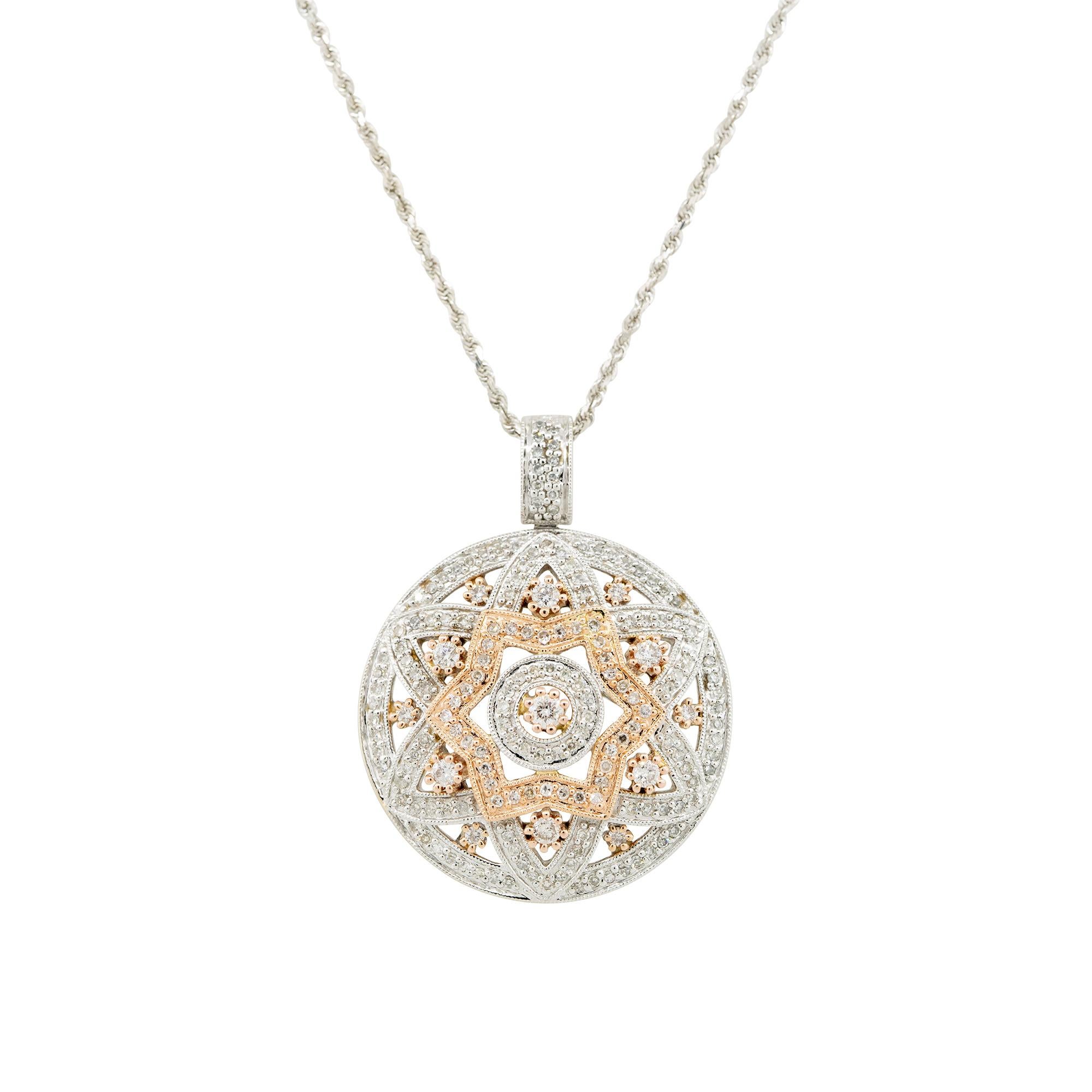 14k White and Rose Gold 1.25ctw Round Diamond Star Pendant on Chain
Material: 14k White Gold and 14k Rose Gold
Diamond Details: Approximately 1.25ctw of Round Brilliant Diamonds
Pendant Length: 27.13mm x 10.31mm x 27.18mm
Total Weight: 11.6g