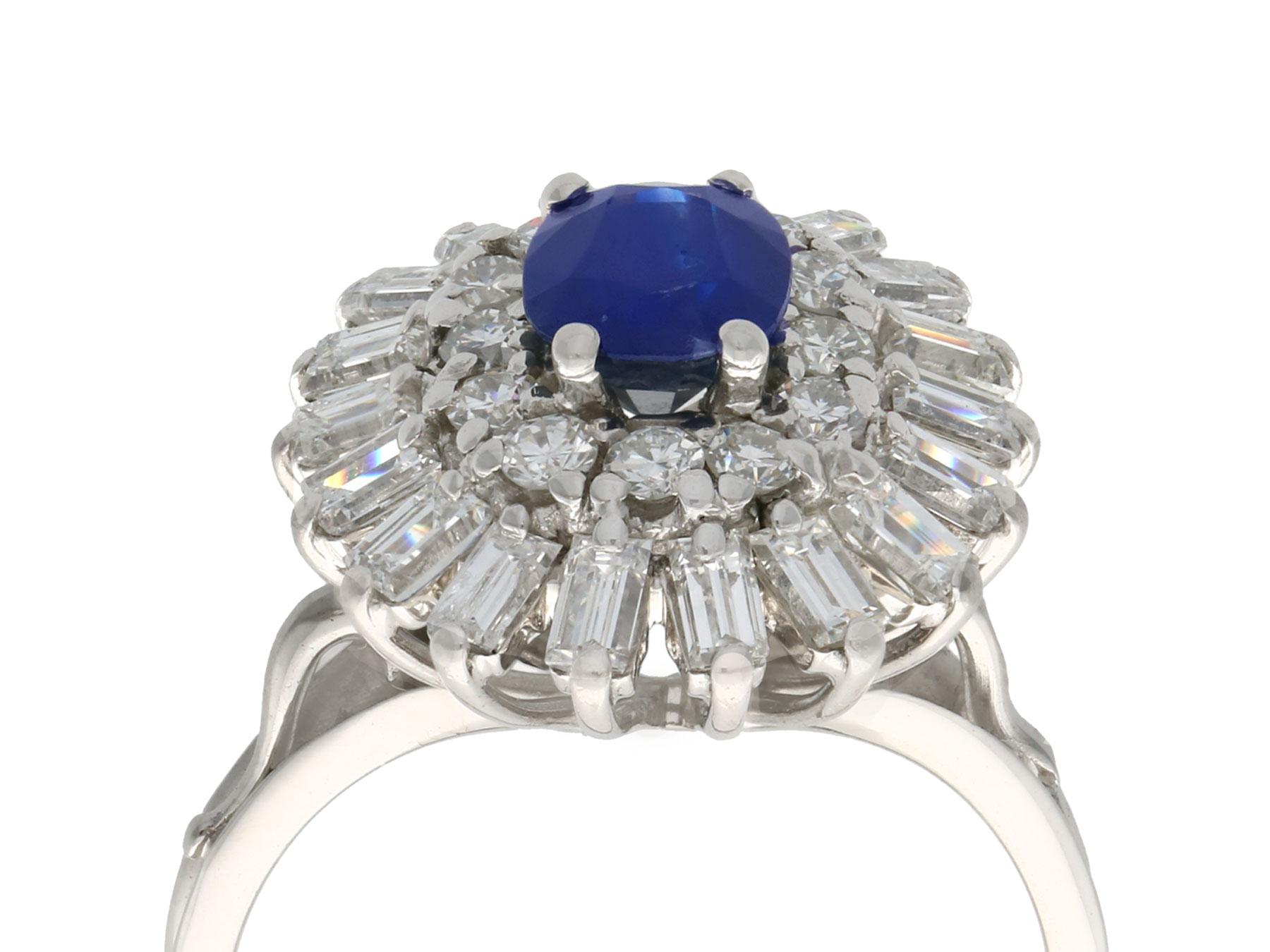 A fine and impressive vintage 1.25 carat natural blue sapphire and 1.15 carat diamond, 18 karat white gold cocktail ring; part of our vintage jewelry and estate jewelry collections

This impressive vintage sapphire and diamond cocktail ring has been