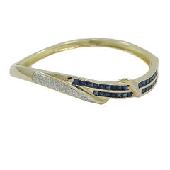 1.25 Carat Sapphire and Diamond Yellow Gold Bangle Bracelet