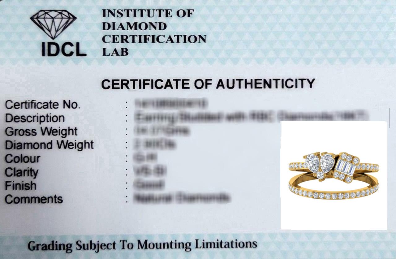Modern 1.25 Carat SI Clarity HI Color Pear Baguette Diamond Ring 18 Karat Yellow Gold For Sale