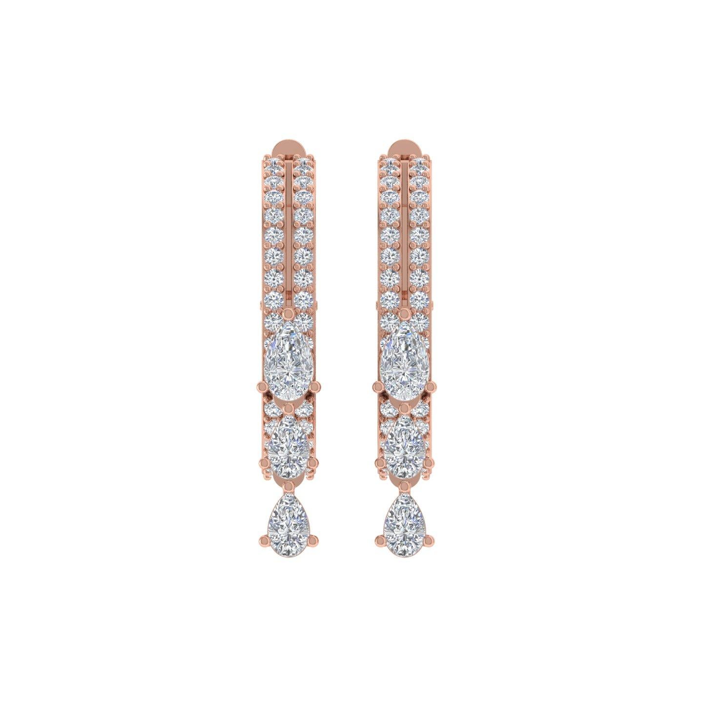 Coulées dans de l'or 18 carats, ces boucles d'oreilles exquises sont serties de 1,25 carats de diamants étincelants.

Suivez la vitrine de Spectrum Jewels pour découvrir la dernière collection et les pièces exclusives. Spectrum Jewels est fièrement