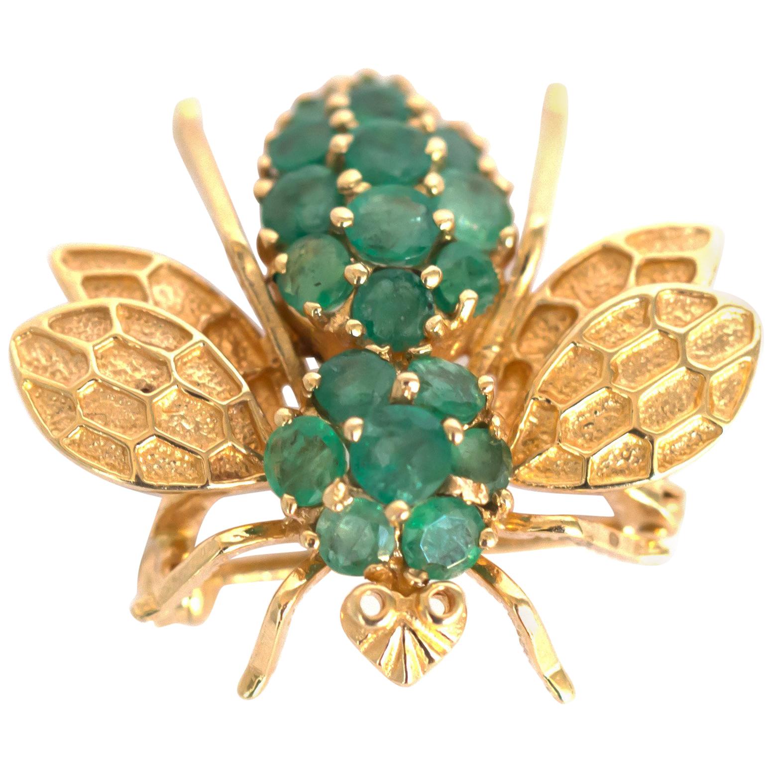 Broche de oro amarillo con esmeralda de 1,25 quilates de peso total