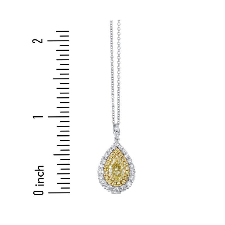 Pear Cut 1.25 Carat Total Weight Yellow Pear and Diamond Halo Pendant in 18k Gold For Sale