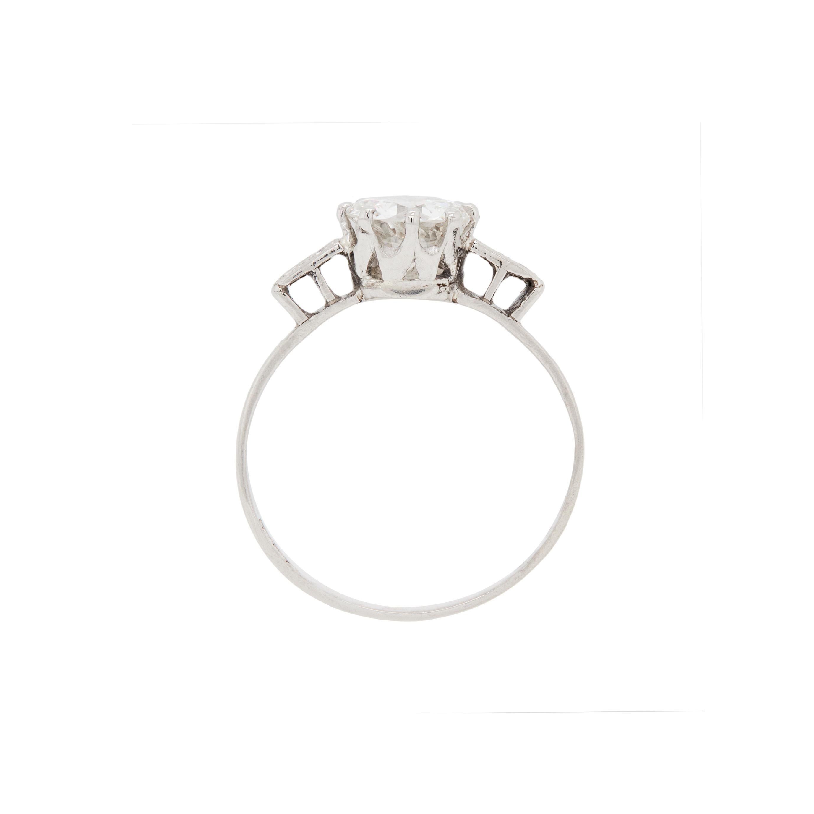 The exquisite design of this 1920s ring has stood the test of time, and it's simply divine.

A stunning transitional cut diamond weighing 1.25 carats is set in a beautifully simple 8-claw setting which accentuates the stone. The stone is lively and