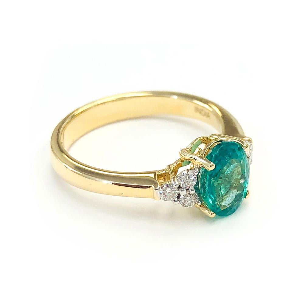 1.25 Carat Zambian Emerald and 0.18 Carats Diamond 14 Karat Gold Bridal Ring In New Condition For Sale In Great Neck, NY