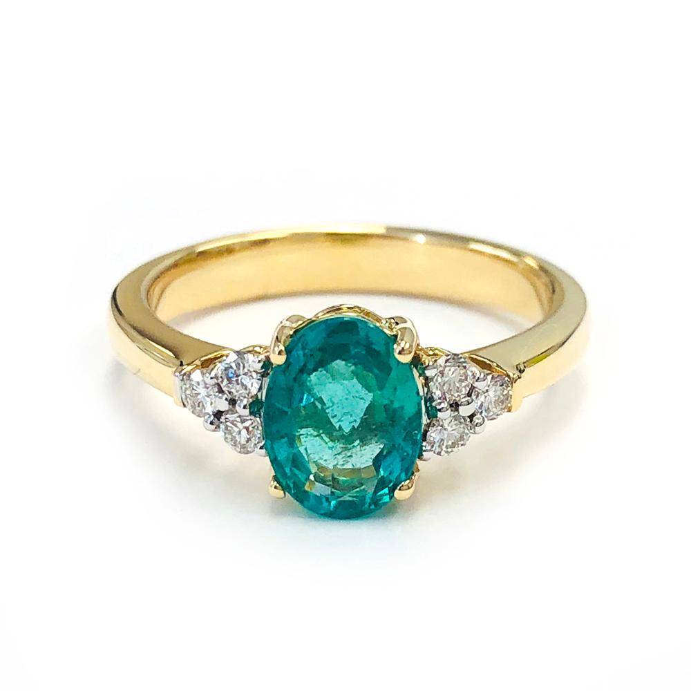 Women's 1.25 Carat Zambian Emerald and 0.18 Carats Diamond 14 Karat Gold Bridal Ring For Sale