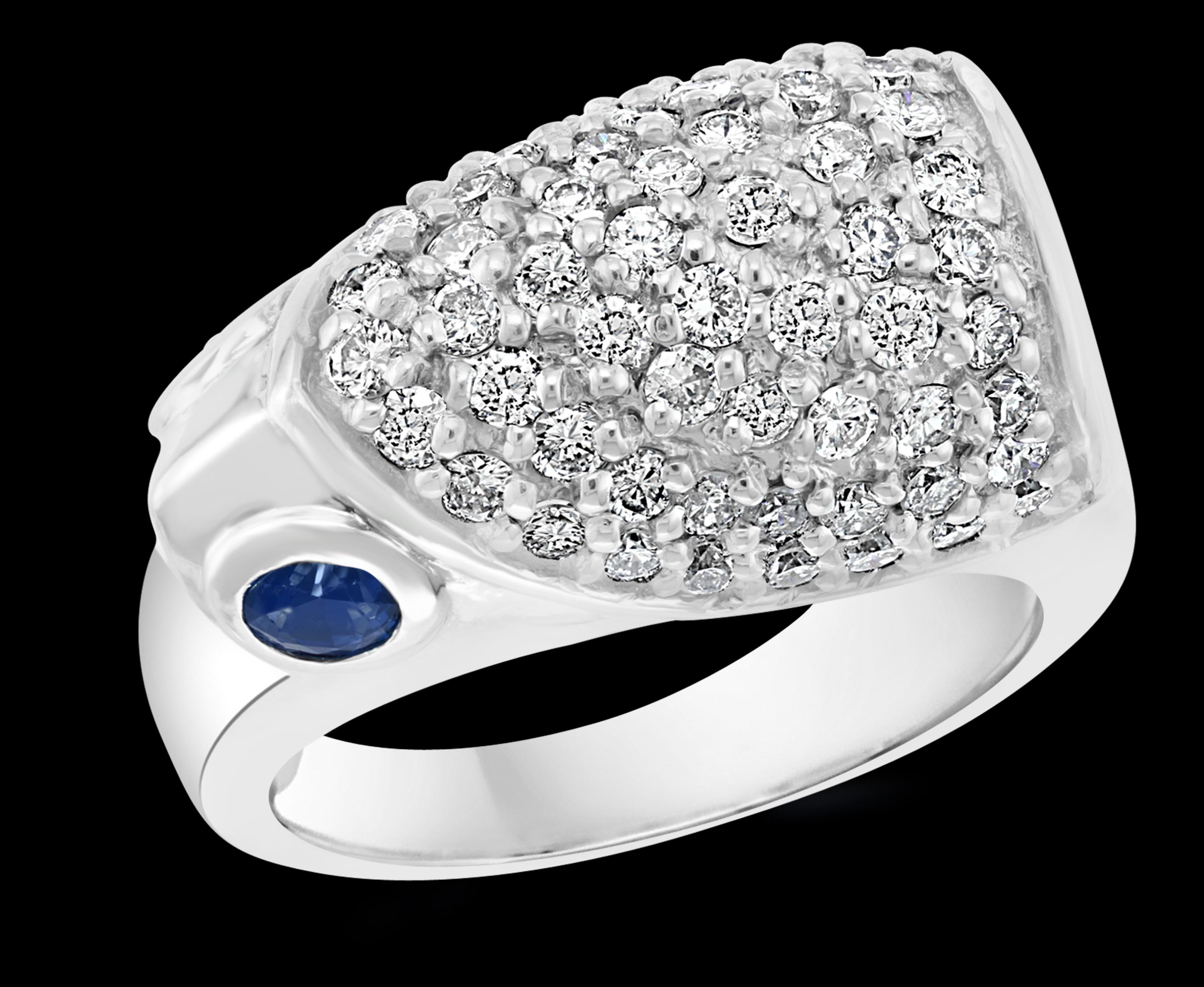 Approximately  1.25 Ct Diamond Animal Cocktail Ring With Sapphire Eyes  In 14 Karat White Gold 

Round Brilliant cut diamond 
14 Karat White  Gold  12.4 Grams
Ring Size 6.5 ( it can be resized to any size for free of charge)
Total Diamond Weight of 